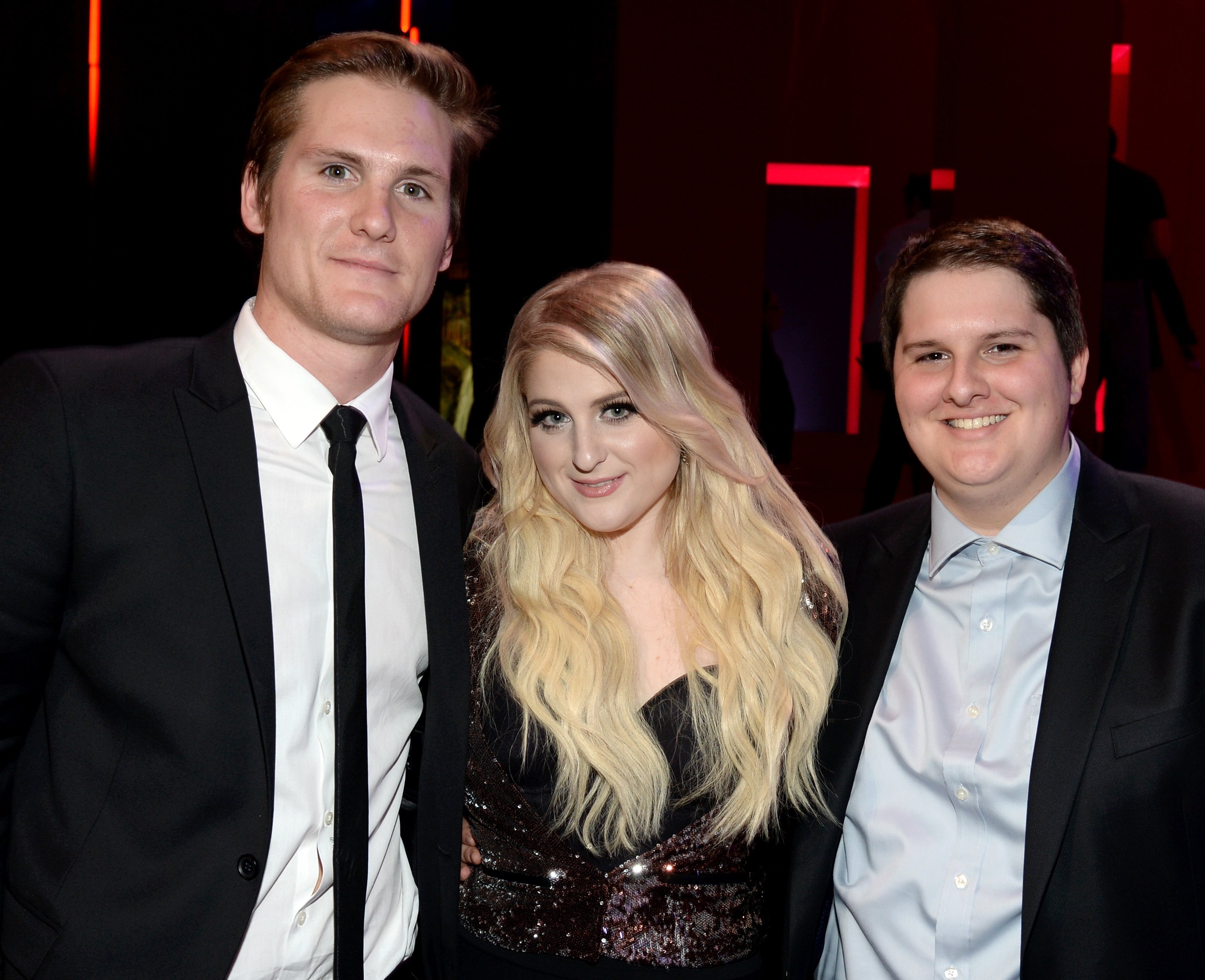 Ryan Trainor, recording artist Meghan Trainor, and Justin Trainor attend the 2015 iHeartRadio Music Awards which broadcasted live on NBC from The Shrine Auditorium on March 29, 2015, in Los Angeles, California. | Source: Getty Images 
