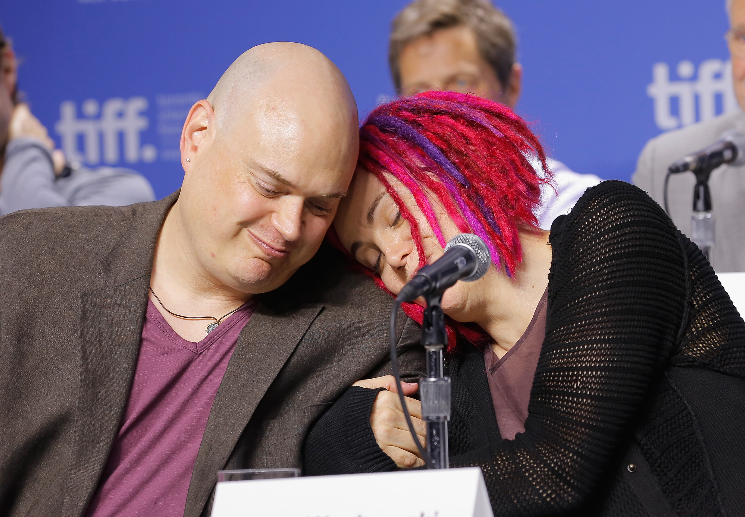 Andy Wachowski and Lana Wachowski speak onstage at the "Cloud Atlas" press conference at TIFF Bell Lightbox on September 9, 2012 in Toronto, Canada. | Source: Getty Images