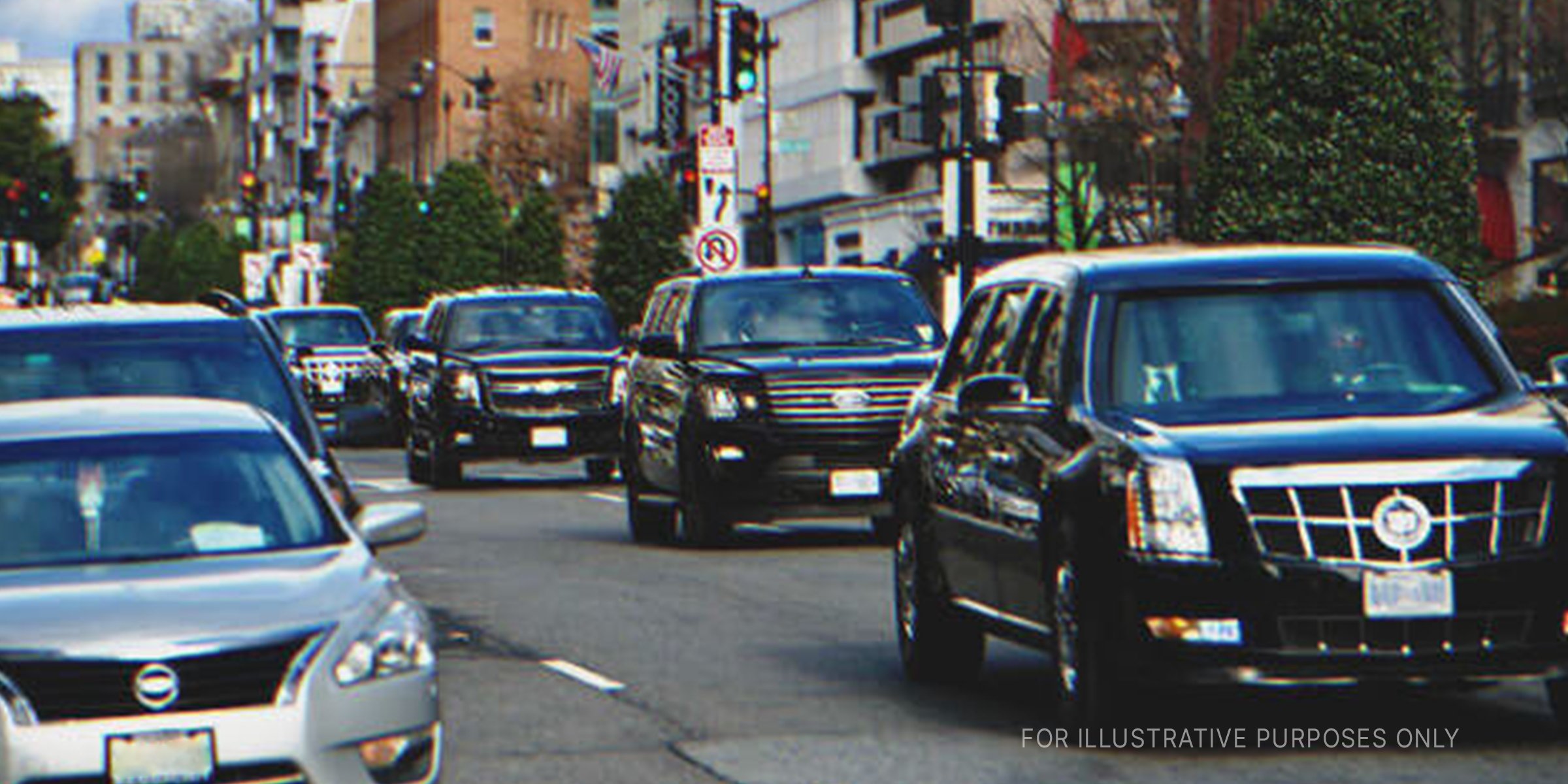 Fleet Of Cars Passing By A Building. | Source: Shutterstock