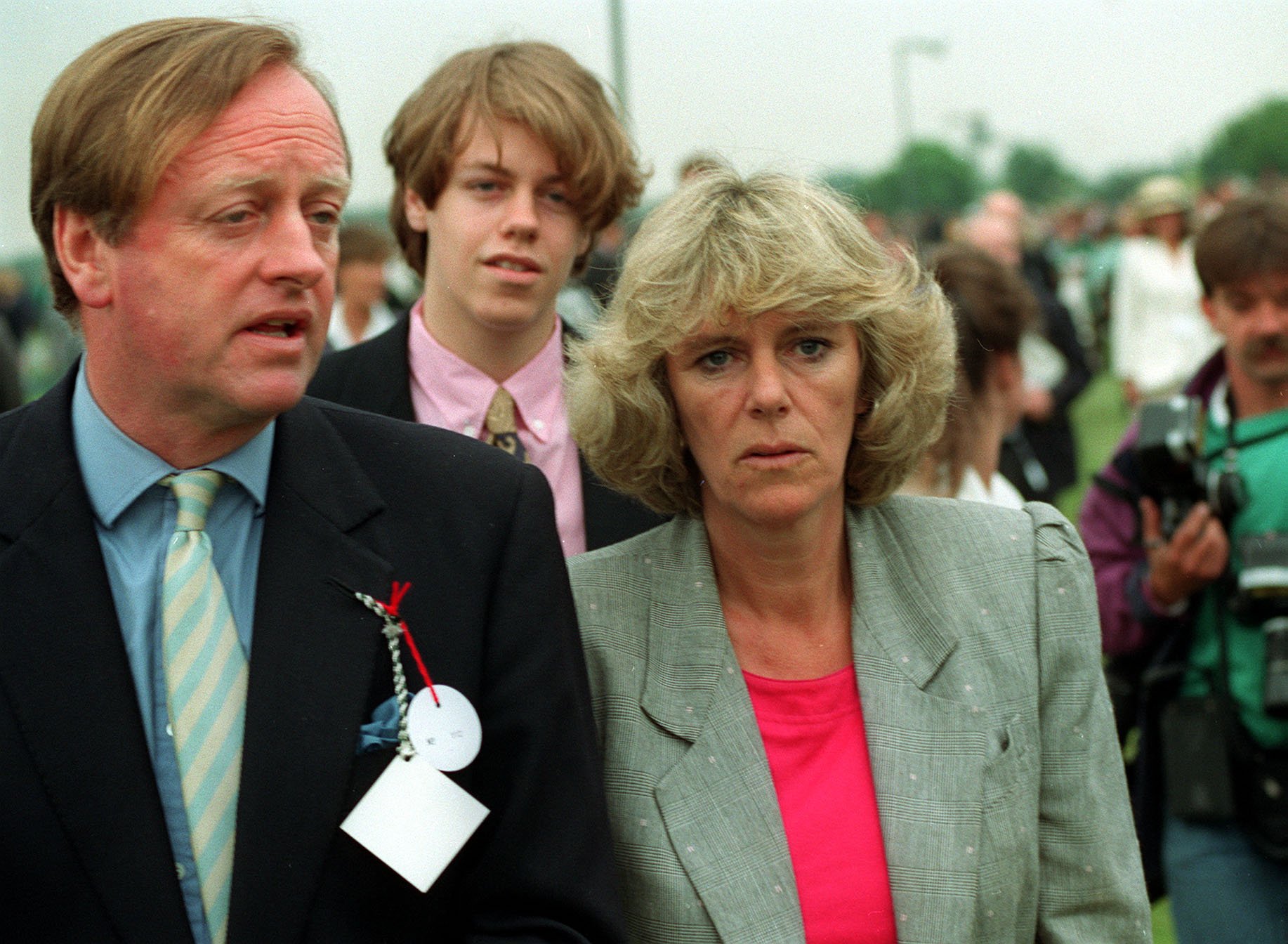 Andrew, his son, Tom, and wife Camilla Parker Bowles at a Polo event at Smith's Lawn in Windsor, on June 7, 1992 | Source: Getty Images