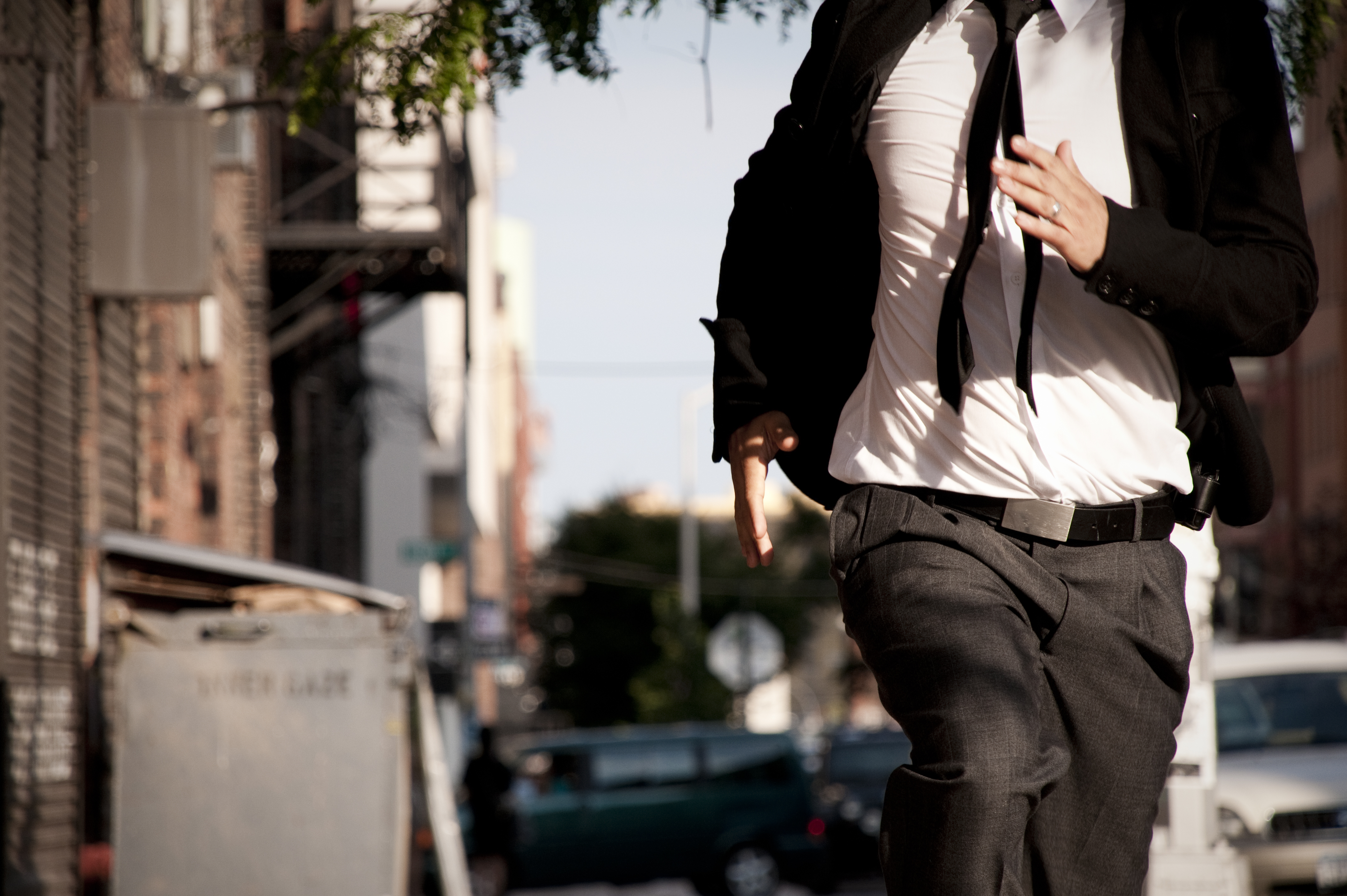 Man in tie running | Source: Shutterstock