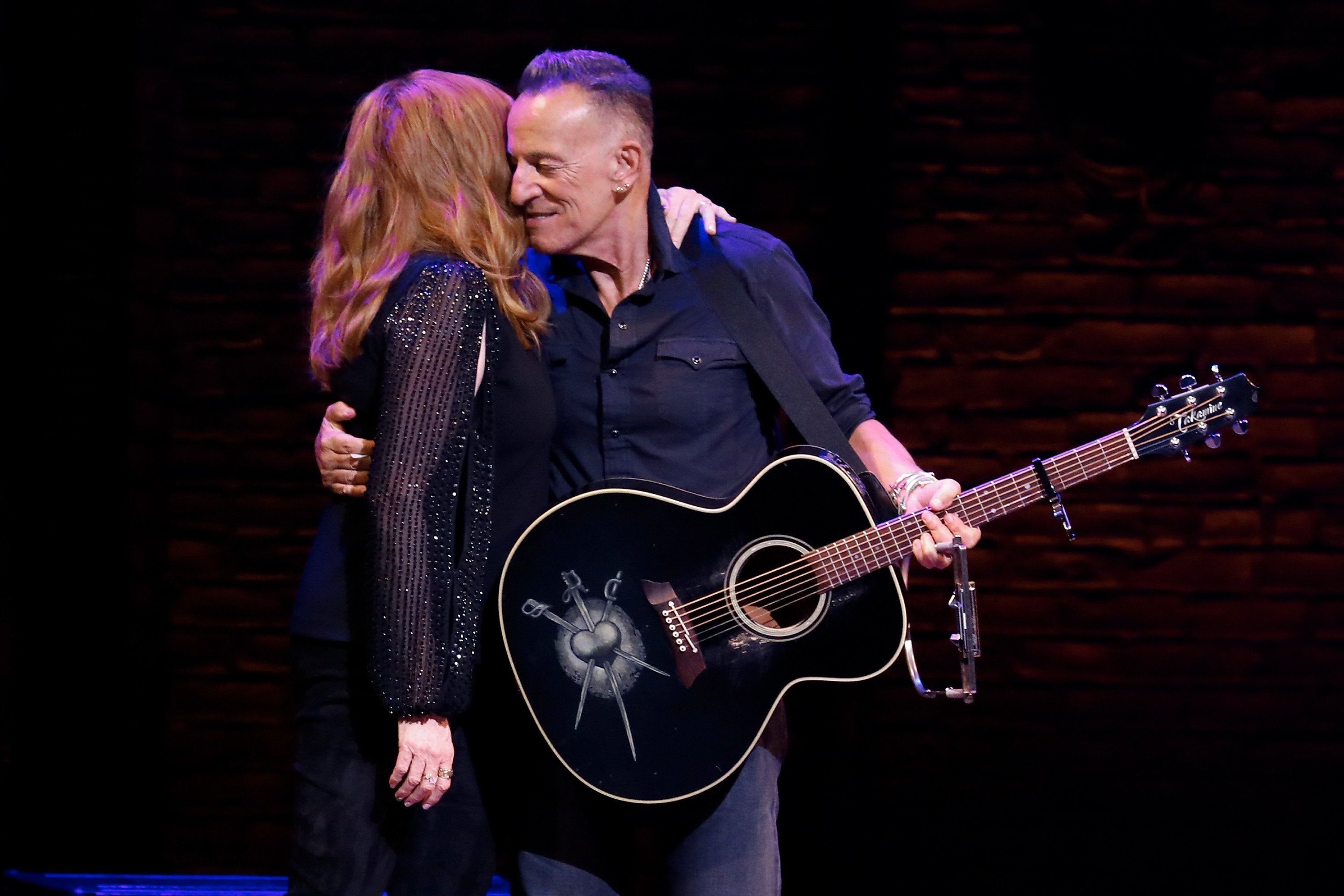 Bruce Springsteen and Patti Scialfa take a bow during reopening night of "Springsteen on Broadway" for a full-capacity, vaccinated audience at St. James Theatre on June 26, 2021 in New York City. | Source: Getty Images