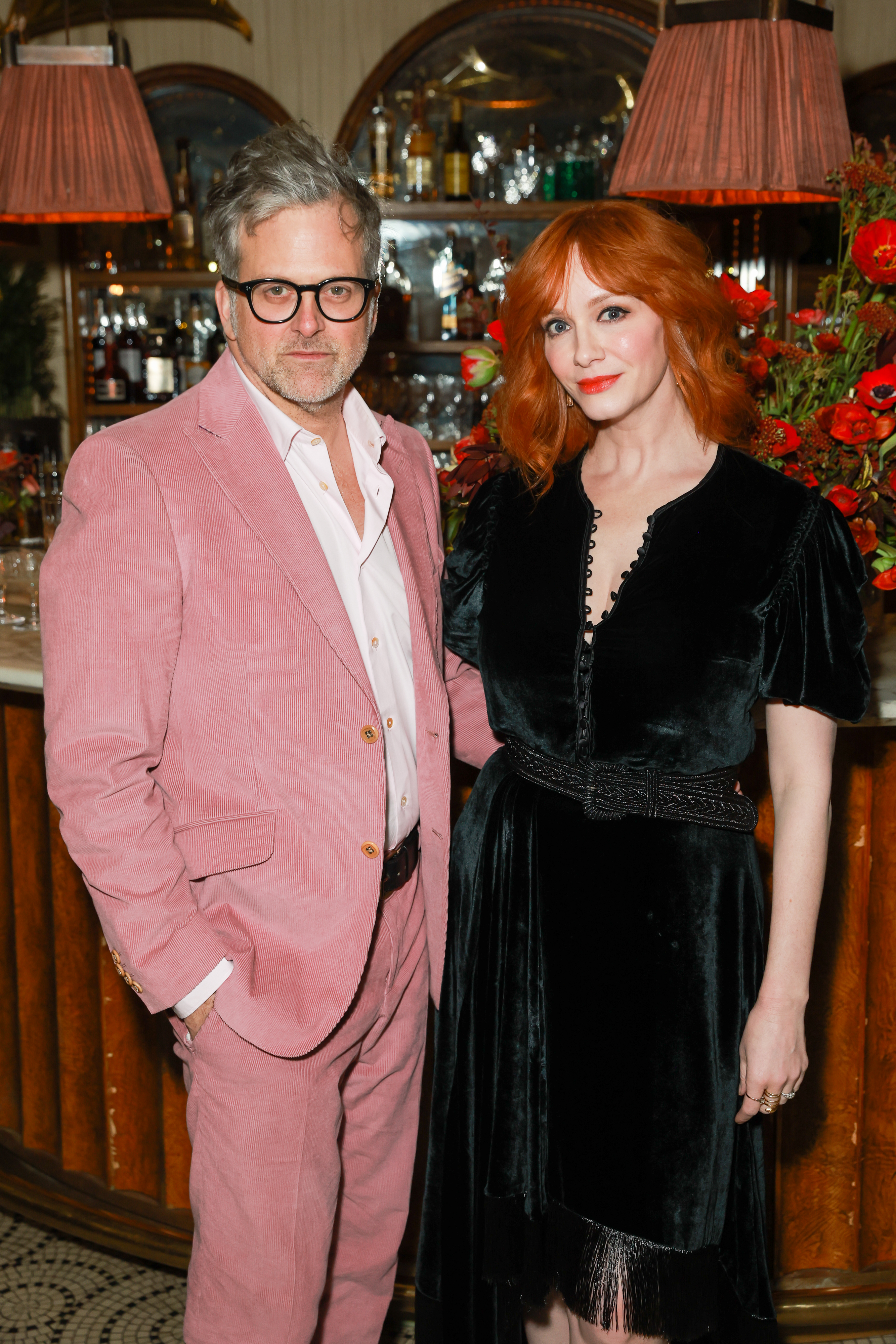 George Bianchini and Christina Hendricks at the Warner Bros. post BAFTA celebration on February 19, 2023, in London, England. | Source: Getty Images