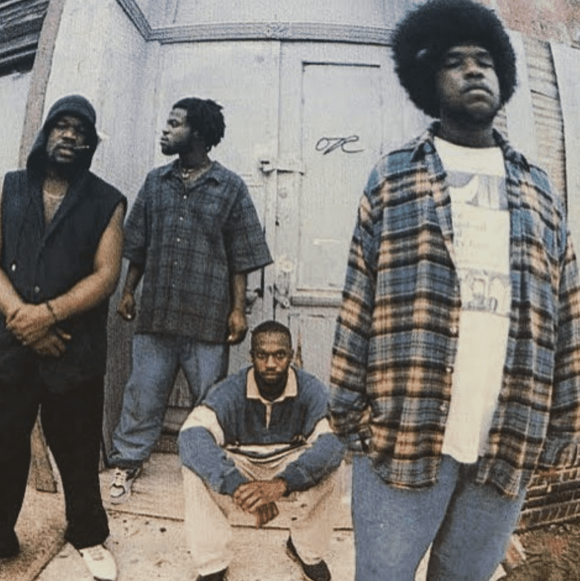 Members of The Roots, Questlove, Black Thought, and Malik B. stand outside a building | Source: instagram.com/questlove