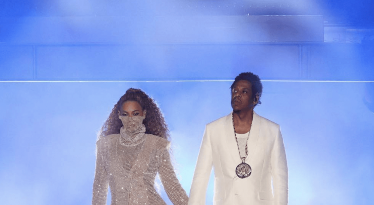 Beyoncé covers up with a coat during recent performance, sparking pregnancy rumors 