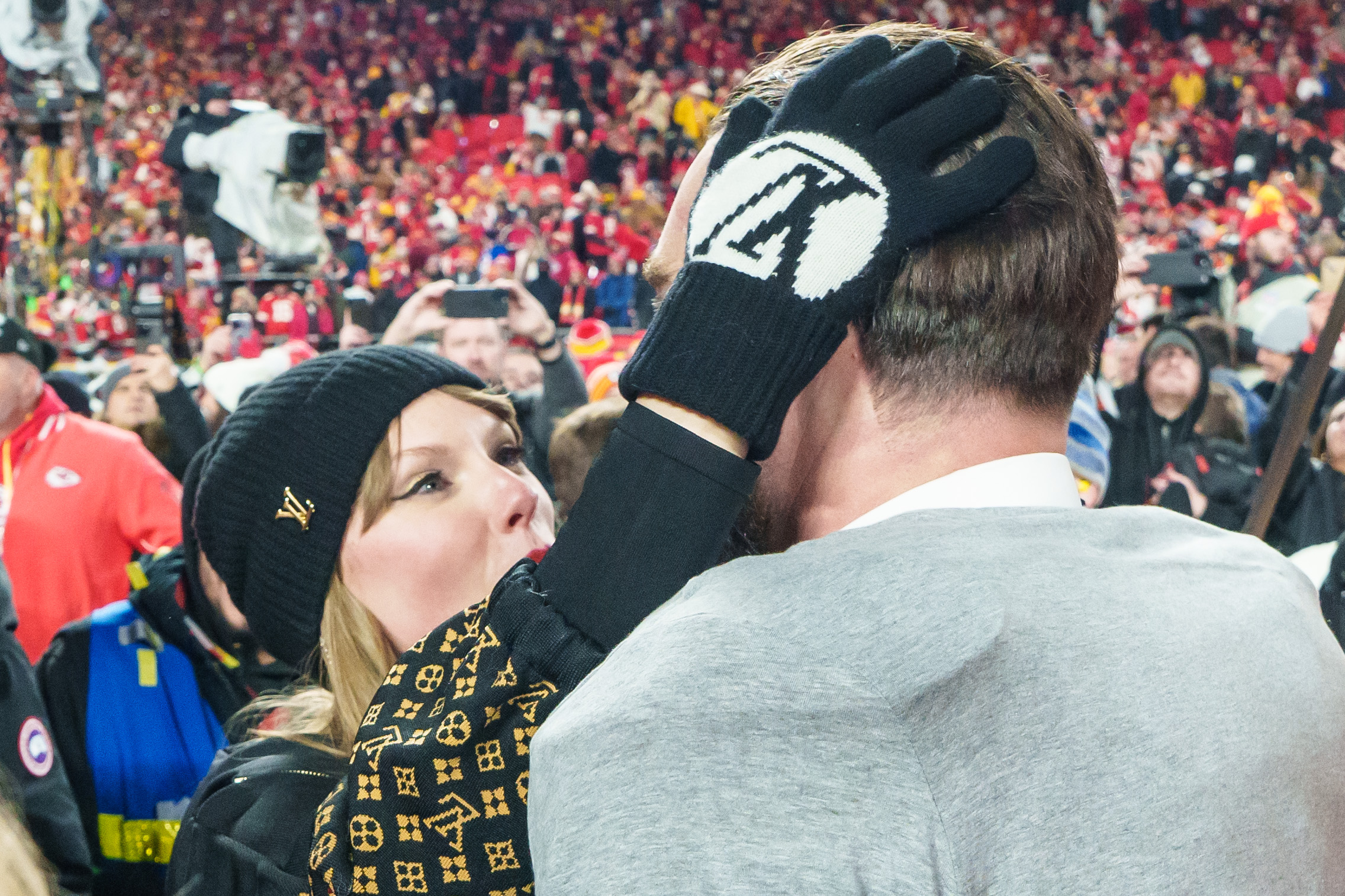 Taylor Swift embraces tight end Travis Kelce #87 of the Kansas City Chiefs following the AFC Championship NFL football game against the Buffalo Bills at GEHA Field at Arrowhead Stadium on January 26, 2025, in Kansas City, Missouri | Source: Getty Images