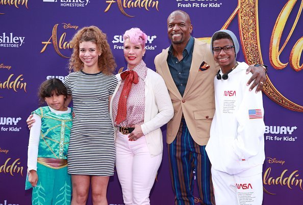 Rebecca King-Crews and Terry Crews (C) and family attend the premiere of Disney's "Aladdin" on May 21, 2019, in Los Angeles, California. | Source: Getty Images.