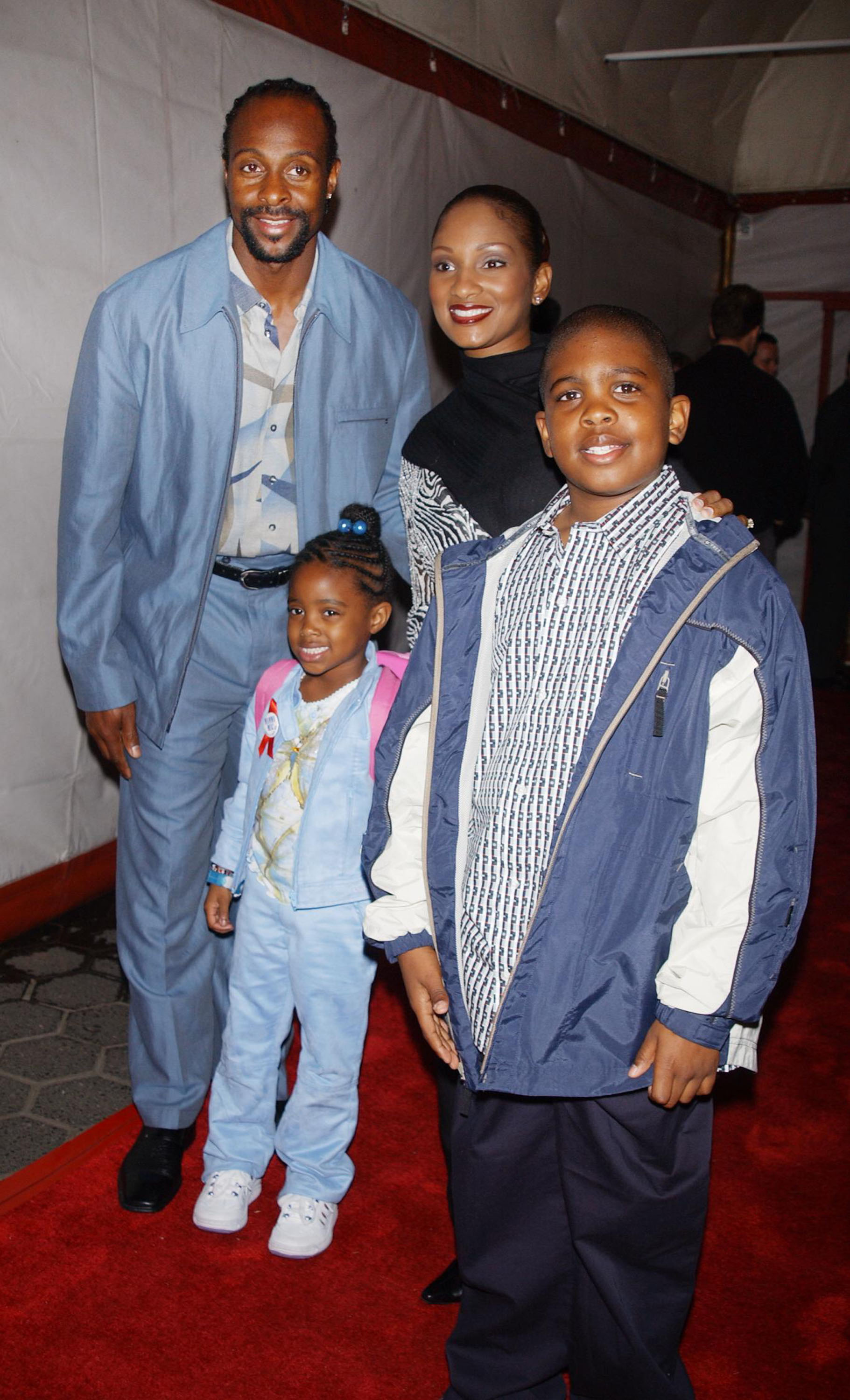 Jerry Rice, his ex-wife Jacqueline Bernice Mitchell and their daughter Jada and son Jerry, Jr. arrive at the McDonald's All American Game Banquet on April 3, 2002, in New York City. | Source: Getty Images