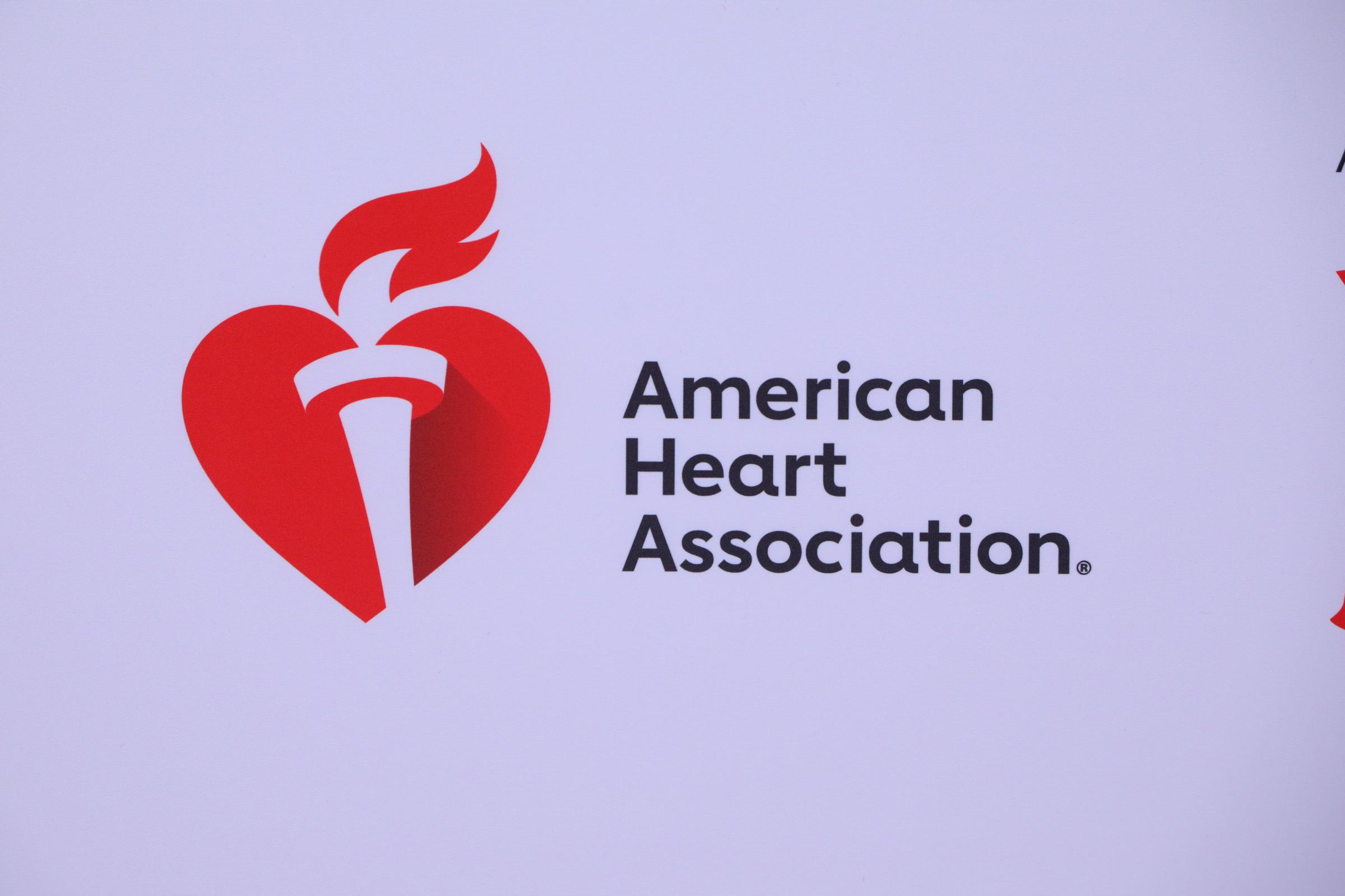 The American Heart Association logo is displayed. The organization said Kristopher Karolkiewicz worked remotely for the nonprofit from September 2023 until July 2026, when his employment ended. | Source: Getty Images