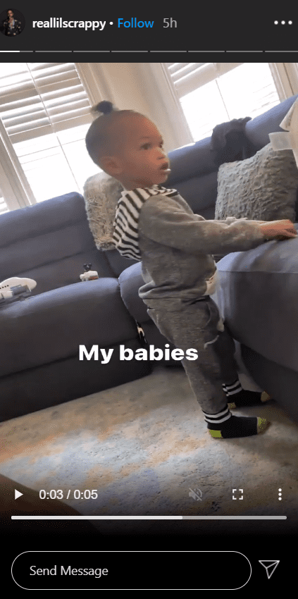 "Love and Hip Hop: Atlanta" stars, Lil Scrappy and Bambi Benson's son, Breland, seen standing next to a couch. | Photo: Instagram/reallilscrappy