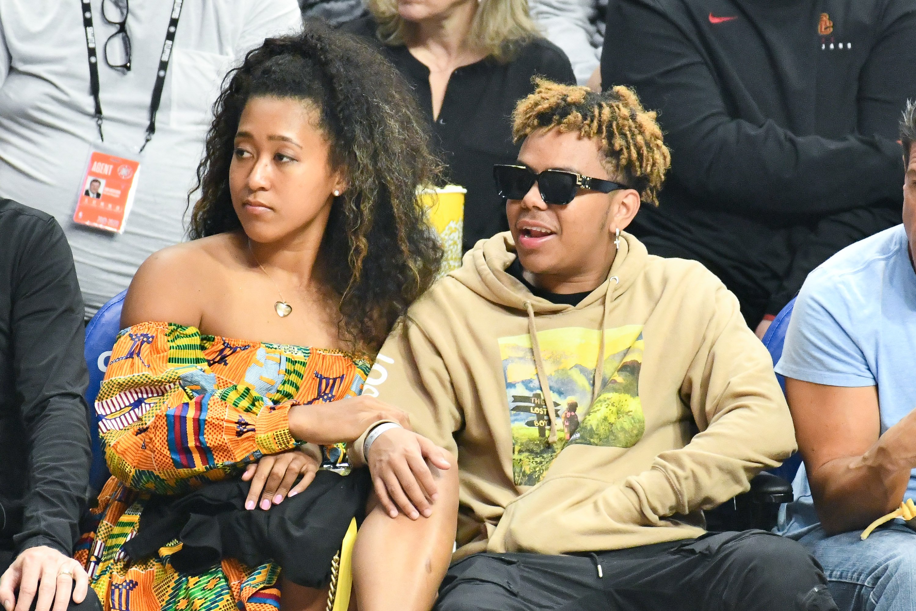 Naomi Osaka and Cordae attend a basketball game between the Los Angeles Clippers and the Washington Wizards at Staples Center on December 1, 2019 in Los Angeles, California. | Source: Getty Images
