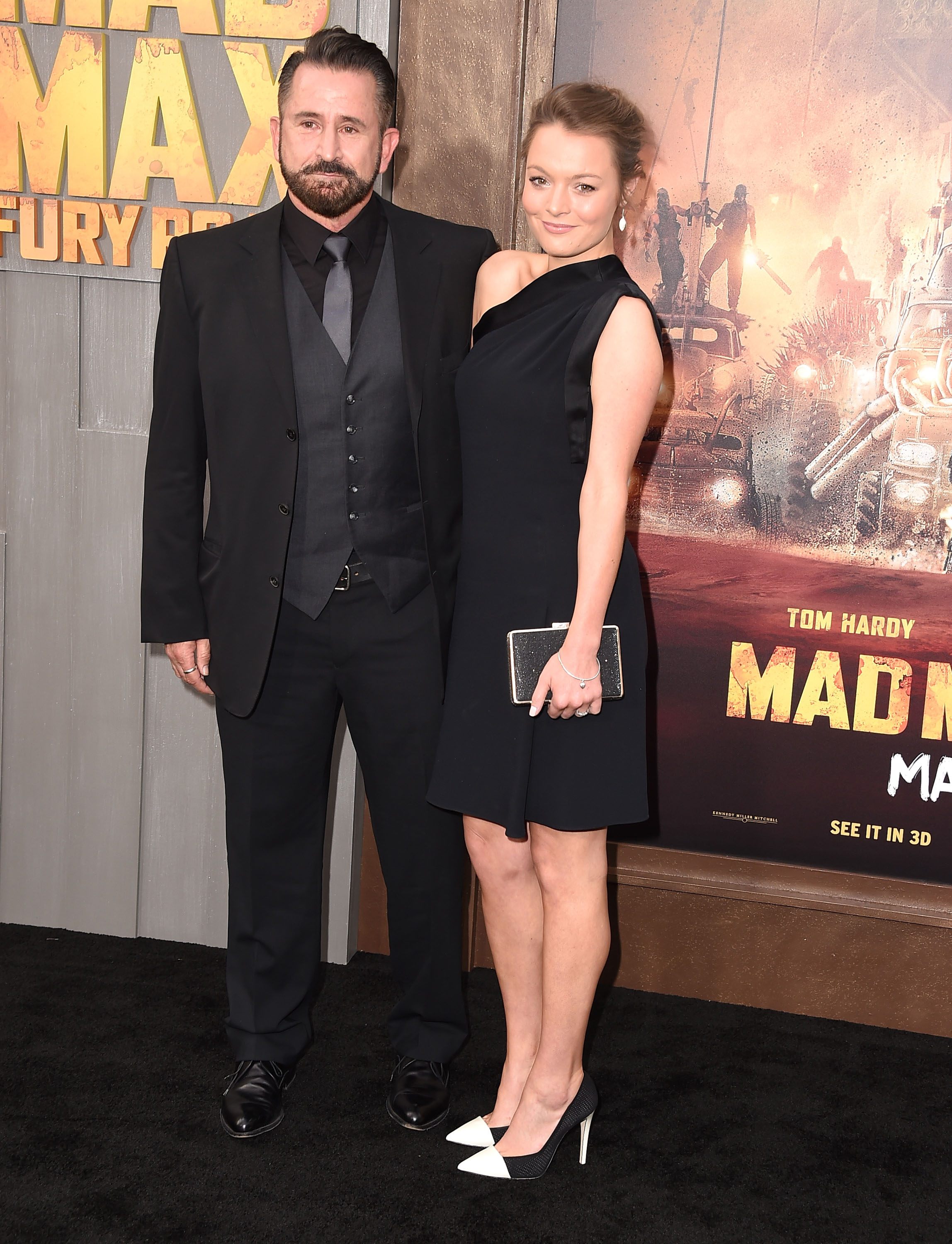 Anthony LaPaglia and Alexandra Henkel pose as they arrive at the "Mad Max: Fury Road" Los Angeles Premiere at TCL Chinese Theatre IMAX on May 7, 2015, in Hollywood, California | Source: Getty Images