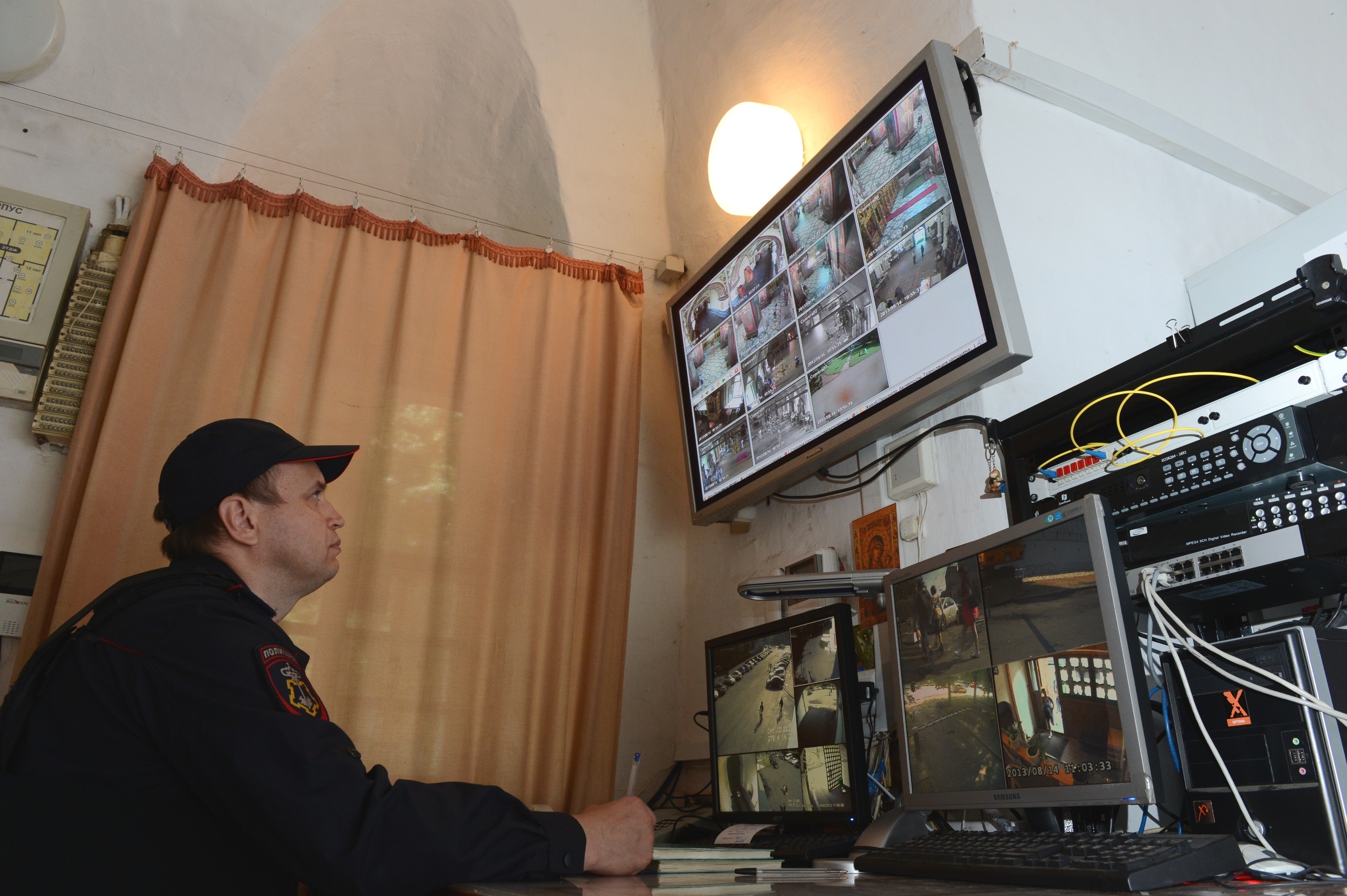 Security looking at CCTV footage | Source: Shutterstock