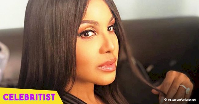 Toni Braxton, 51, defies her age in golden see-through dress with deep cleavage in birthday pic