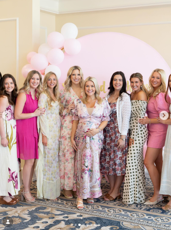 Karoline Leavitt is joined by a larger group of attendees dressed in their floral-themed outfits | Source: Instagram/kieghan.nangle