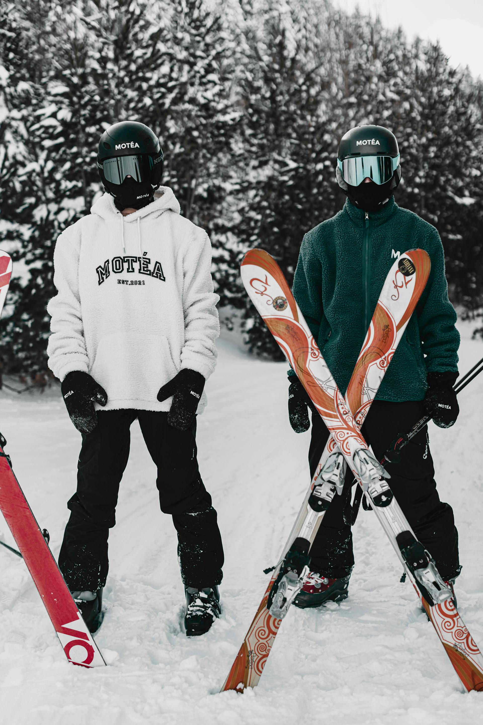 Two skiers standing in the snow | Source: Pexels