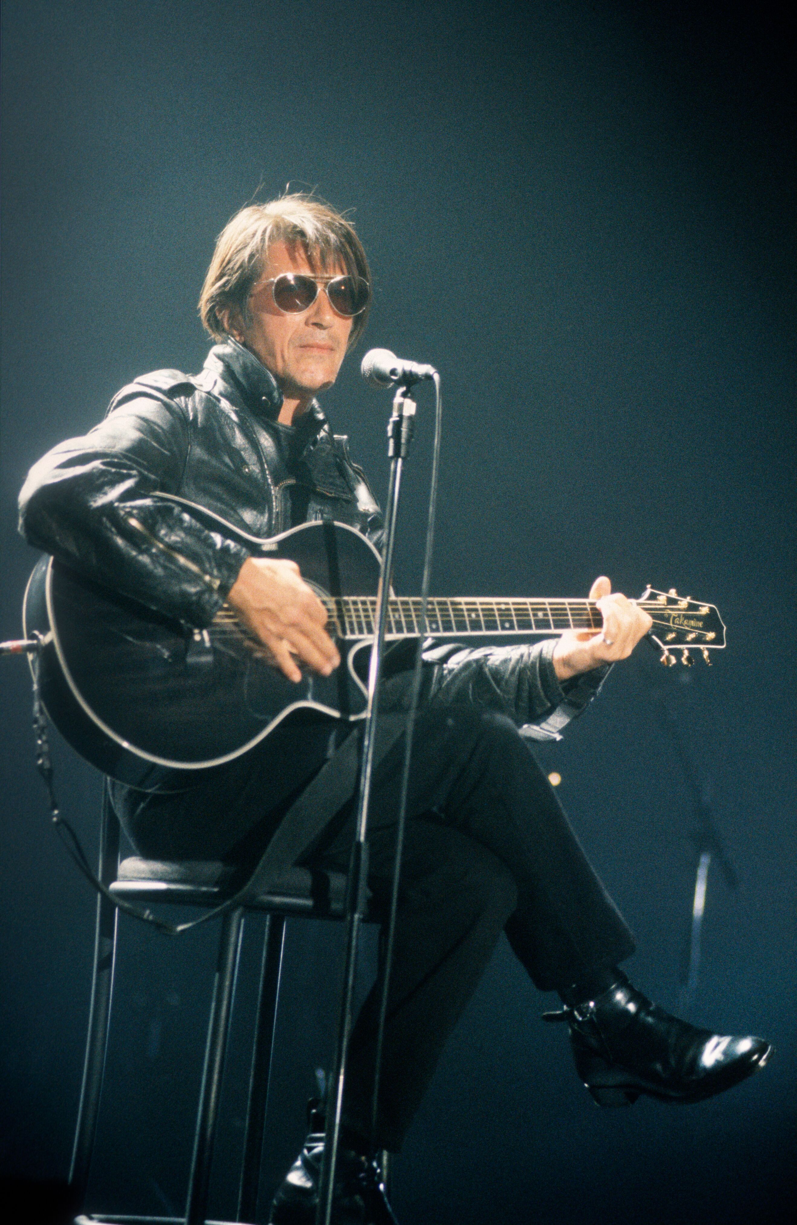 Jacques Dutronc au concert lors du Vorst Nationaal, Bruxelles, Belgique, 20/04/1993. | Photo : Getty Images Jacques Dutronc au concert lors du Vorst Nationaal, Bruxelles, Belgique, 20/04/1993. | Photo : Getty Images