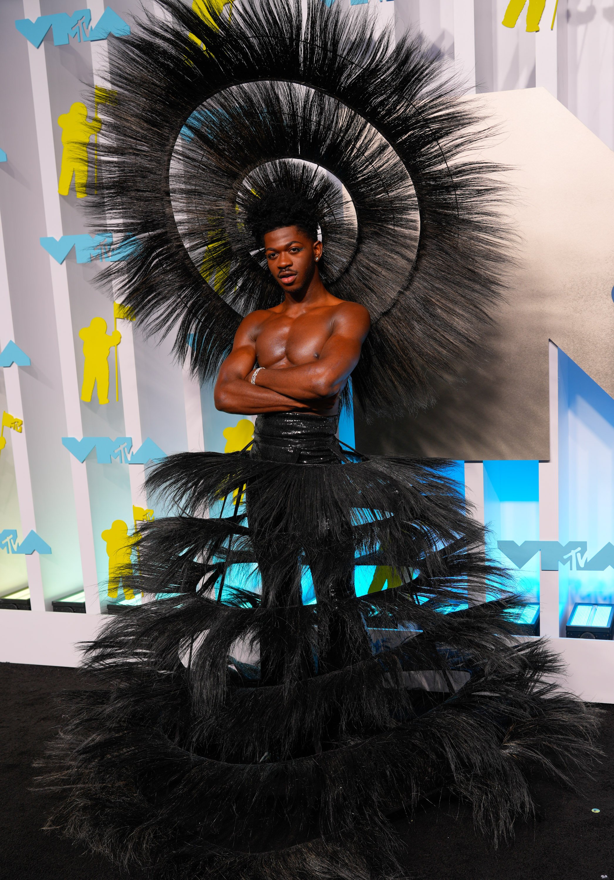 Lil Nas X arrives at 2022 MTV VMAs at Prudential Center on August 28, 2022 in Newark, New Jersey. | Source: Getty Images
