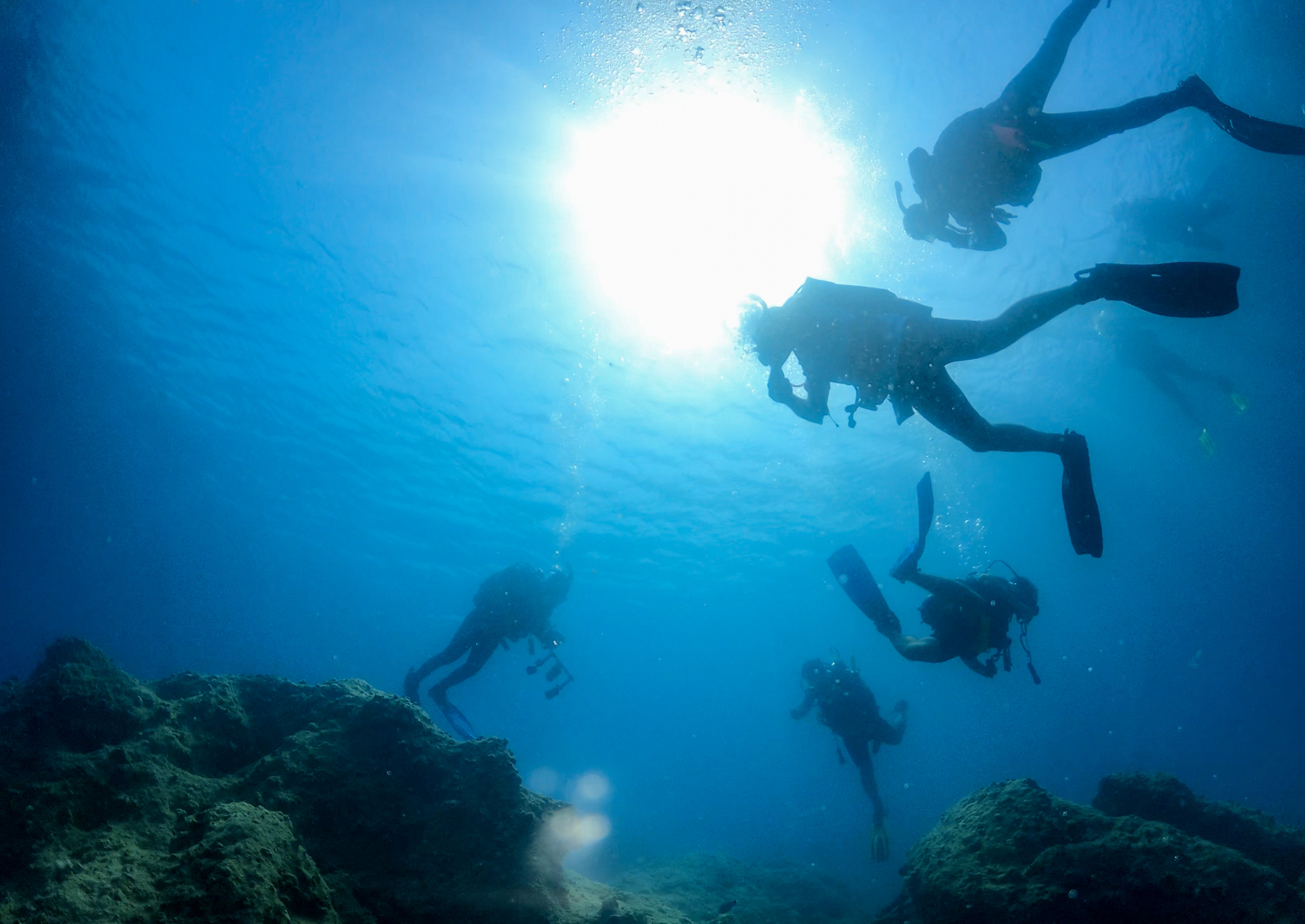 Divers in the deep waters | Source: Getty Images