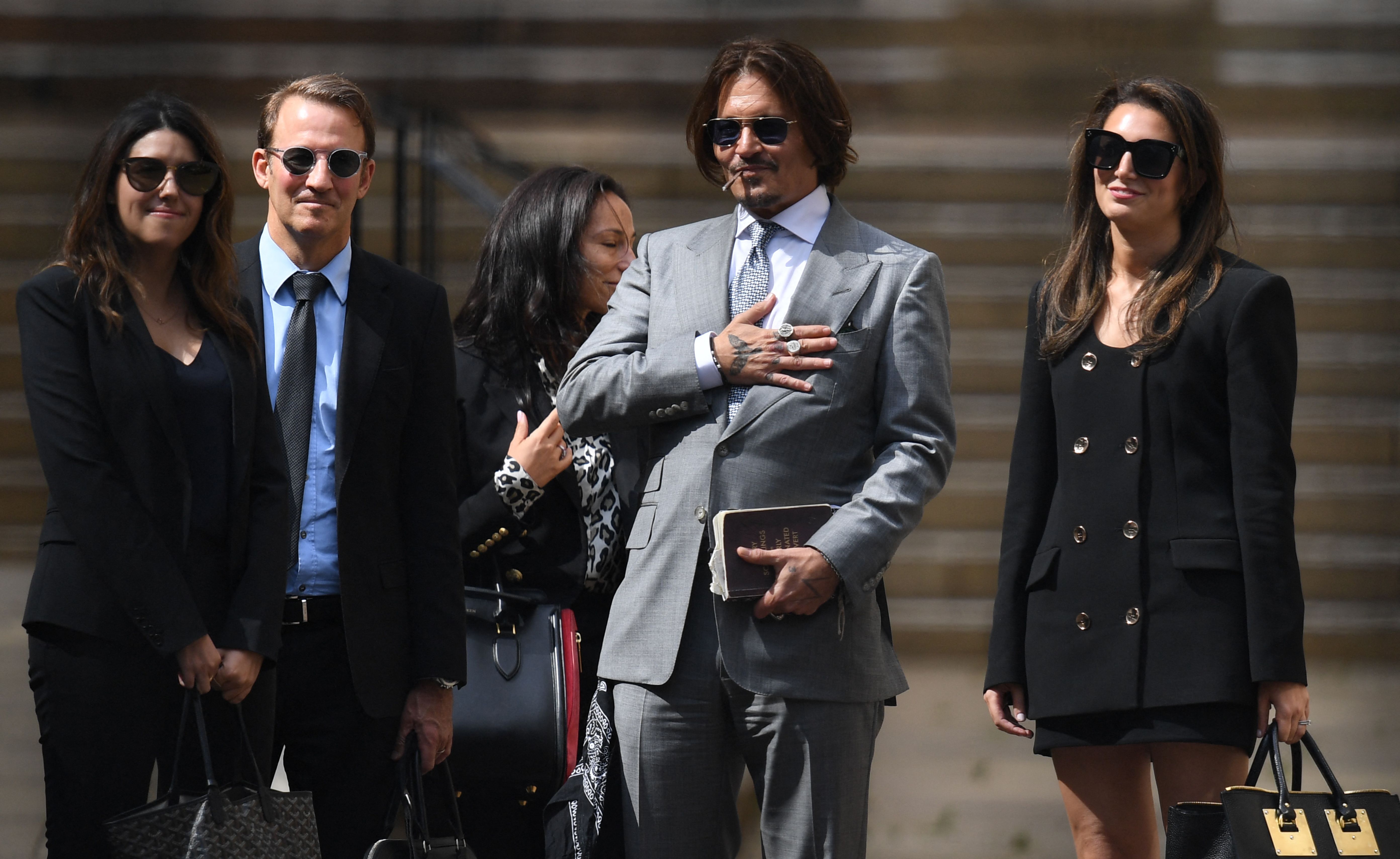 Johnny Depp photographed with his legal team at the High Court on July 16, 2020 in London | Source: Getty Images