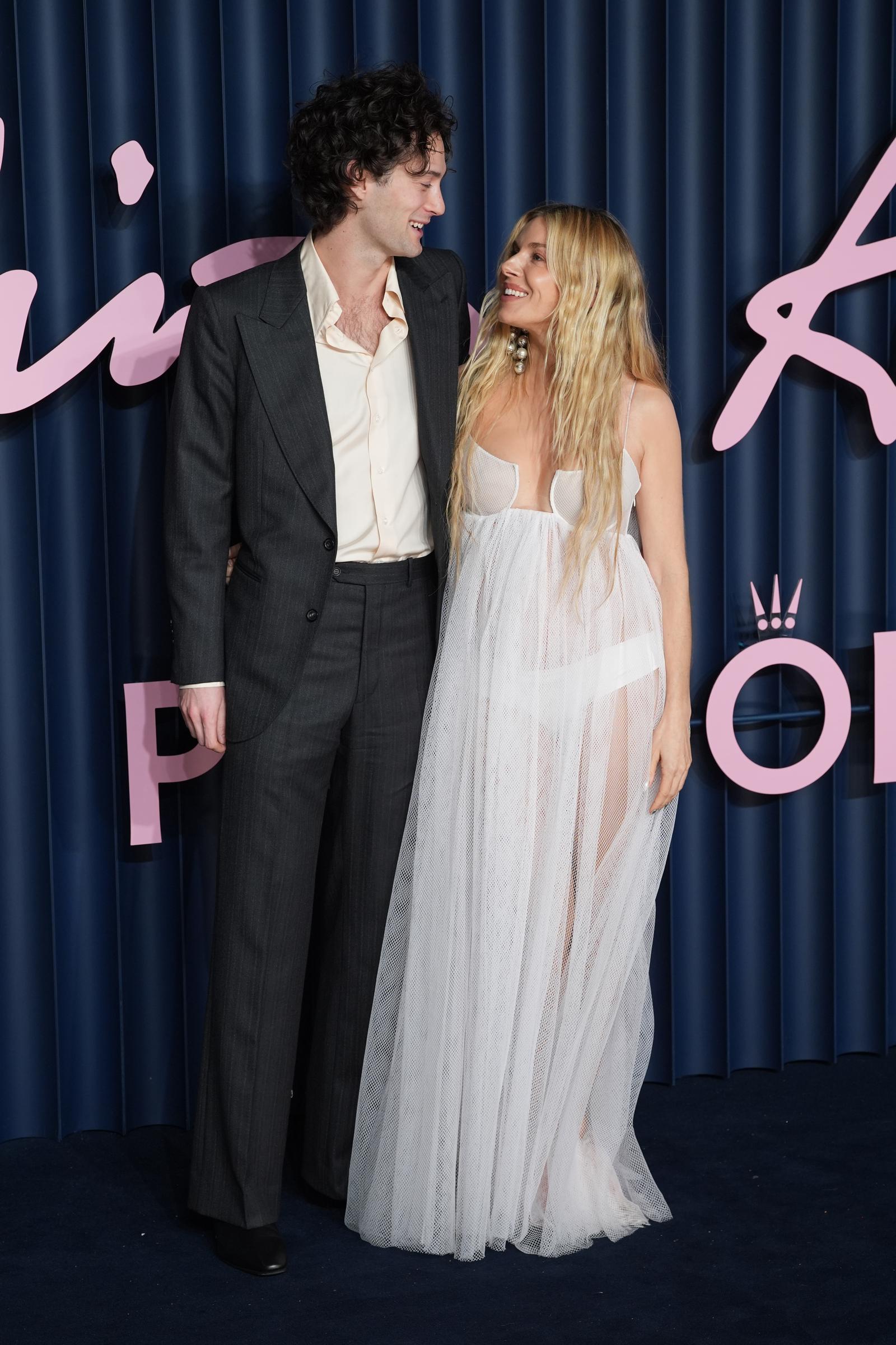 Oli Green and Sienna Miller attend The Fashion Awards 2025 presented by Pandora at the Royal Albert Hall on 1 December 2025 in London, England. | Source: Getty Images
