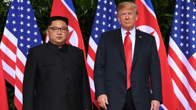 North Korean Leader Kim Jong-un standing next to President Donald Trump in Vietnam | Twitter: @thehill