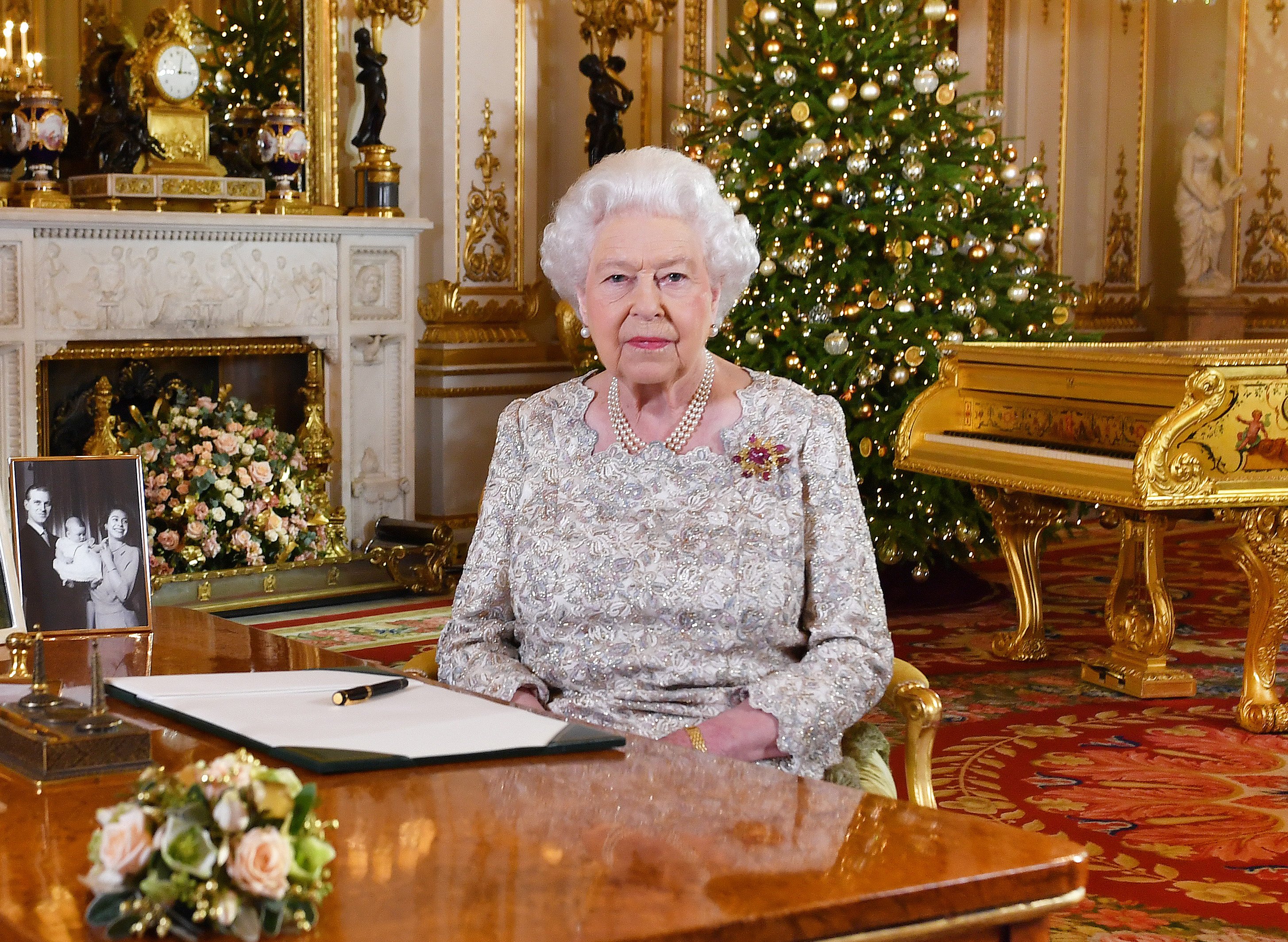 Queen Elizabeth II poses before recording her annual Christmas Day message on December 24, 2018 in London, United Kingdom. | Source: Getty Images.