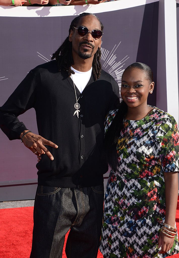 Cori Broadus and Snoop Dogg arrive at the 2014 MTV Video Music Awards in Inglewood, California. I Image: Getty Images.