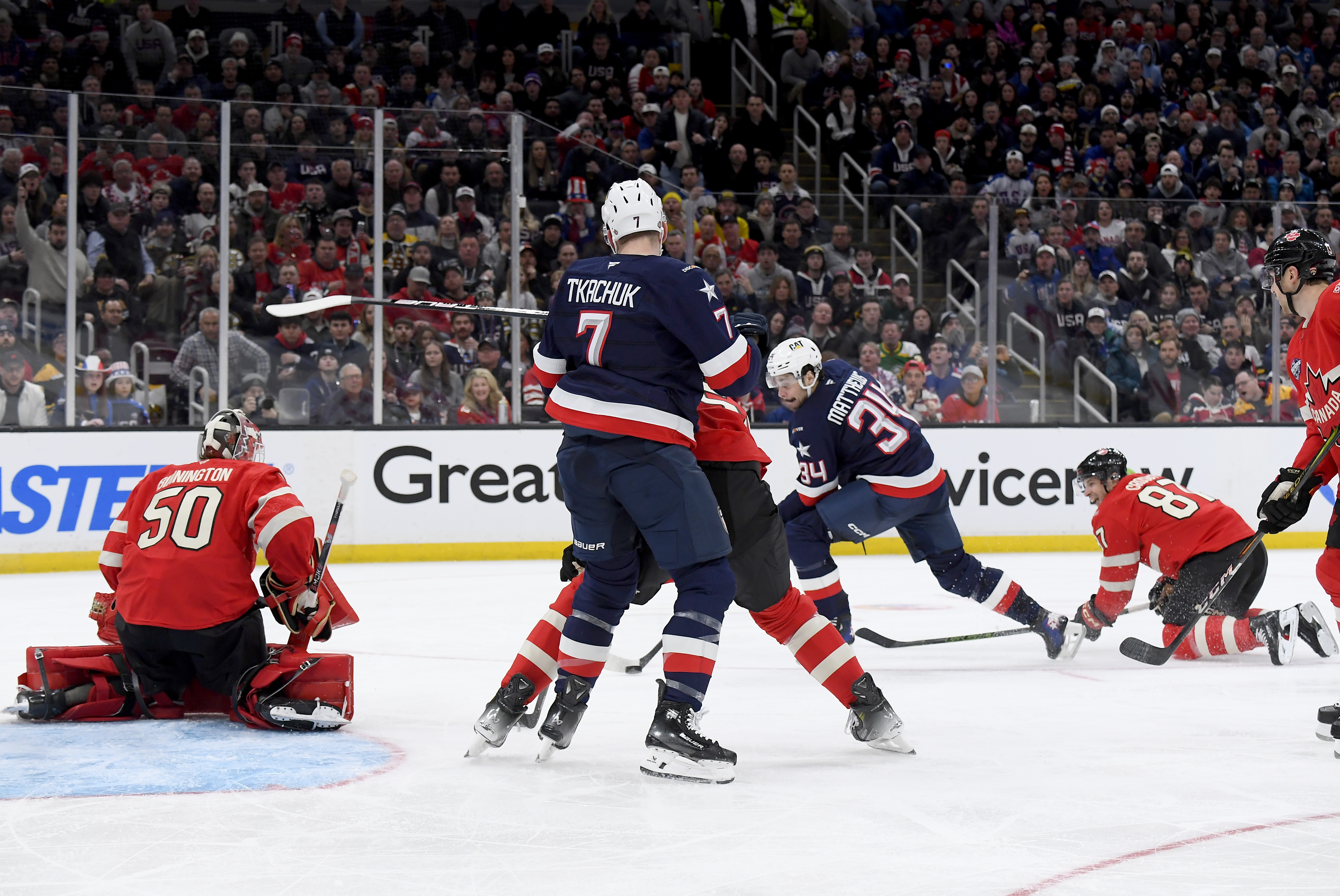 Auston Matthews, #34 of Team United States, looks to put a backhand shot on Jordan Binnington, #50 of Team Canada, during the second period on February 20, 2025 | Source: Getty Images