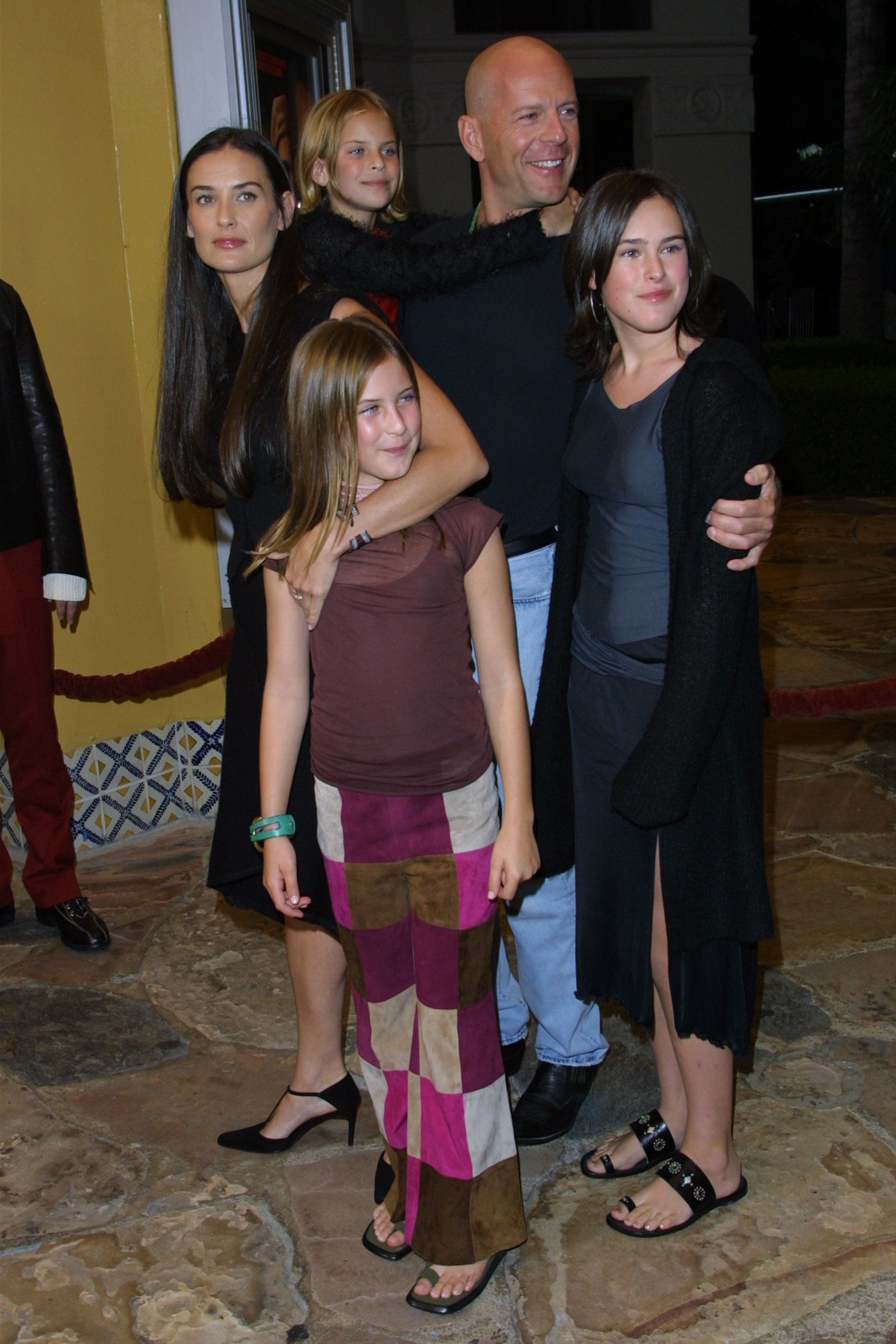 Demi Moore and Bruce Willis with their daughters Rumer, Scout, and Tallulah Willis at the premiere of the film "Bandits" on October 4, 2001, in Westwood, California. | Source: Jason Kirk/Getty Images