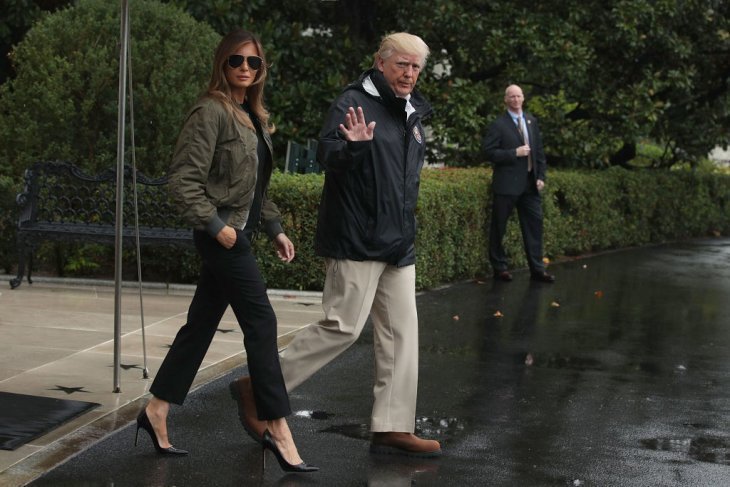 U.S. President Donald Trump and first lady Melania Trump prior to their Marine One departure from the White House August 29, 2017, in Washington, DC. to Texas to observe the Hurricane Harvey relief efforts. | Source: Getty Images.
