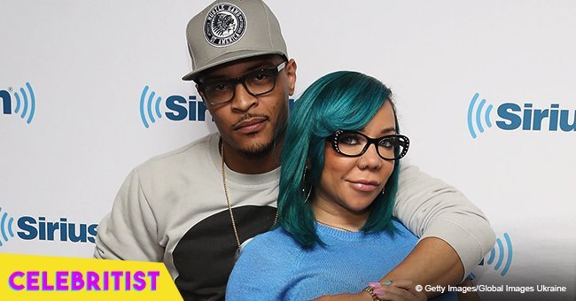T.I. slammed after being caught on camera with another woman 