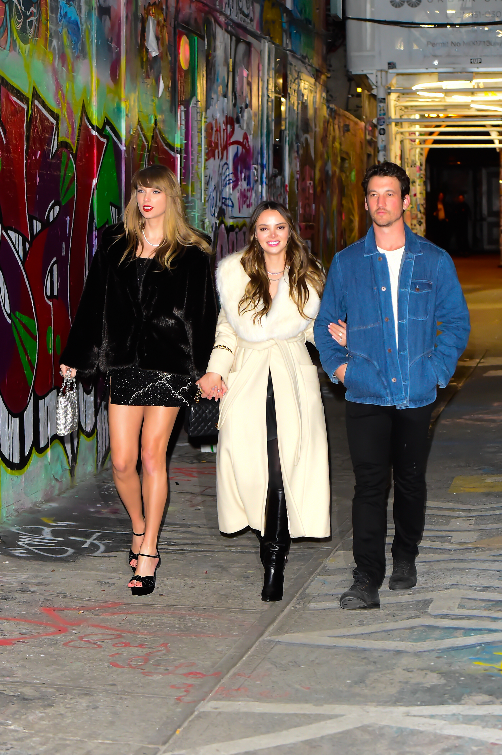 Taylor Swift celebrates her birthday with Keleigh Sperry and Miles Teller on December 13, 2023 in New York City. | Source: Getty Images