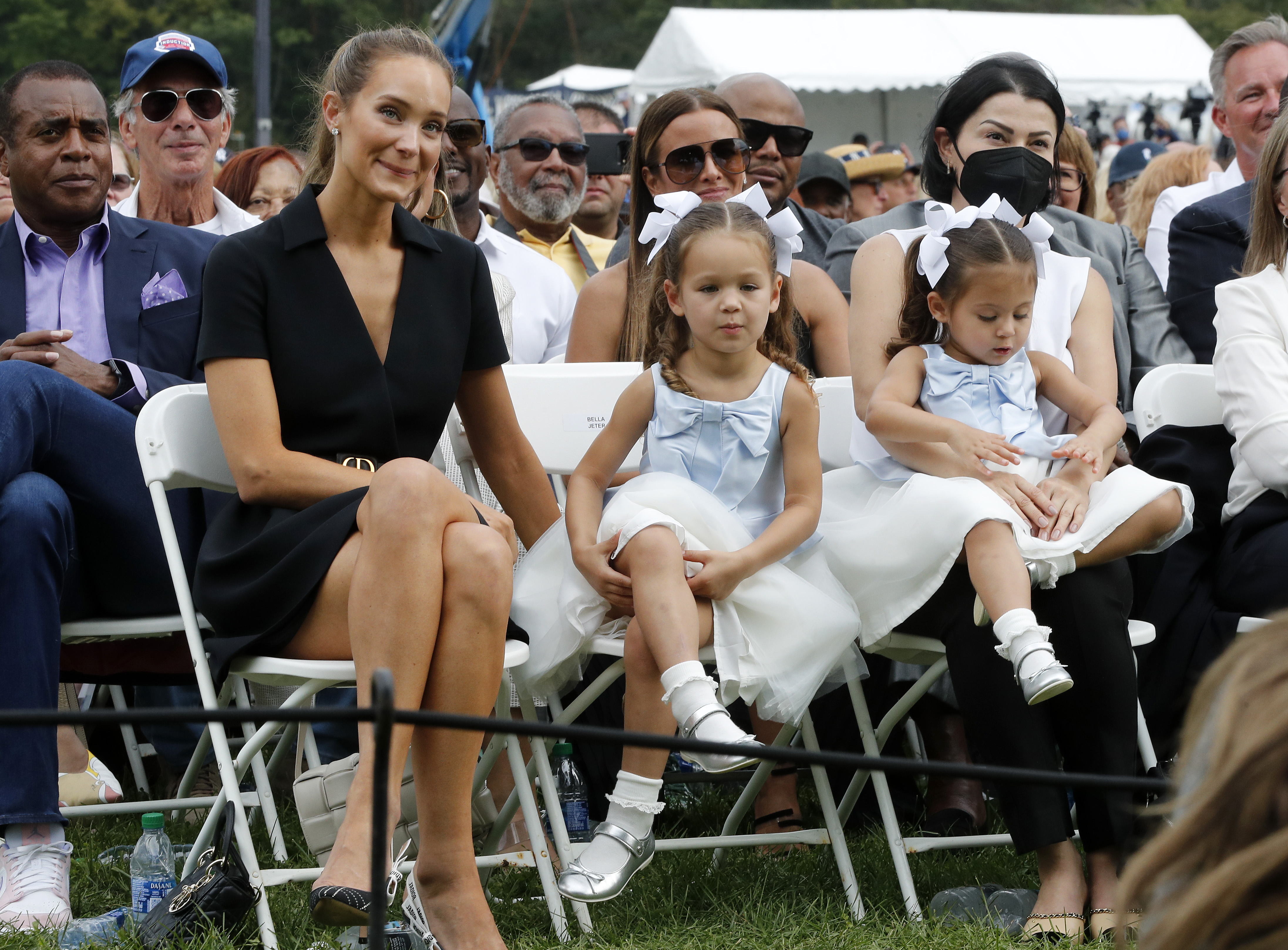 Story Jeter, with her sister Bella and mother Hannah Davis Derek Jeter induction ceremony into the Baseball Hall of Fame in 2021, in New York. | Source: Getty Images