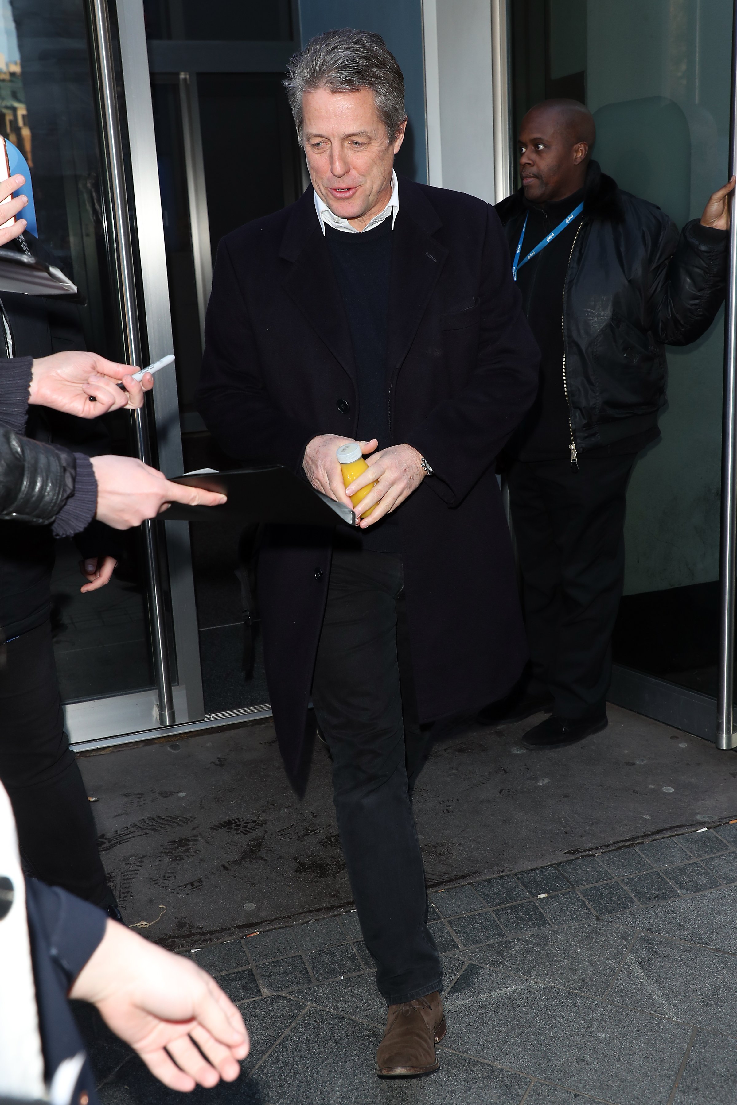 Hugh Grant leaving Heart Breakfast Radio Station in London, England on December 11, 2019 | Source: Getty Images 