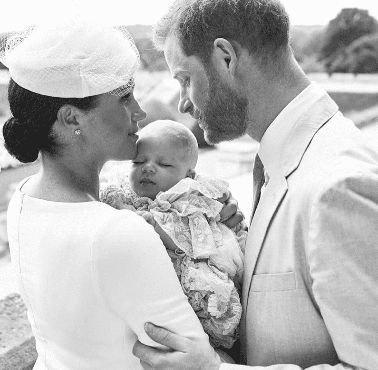 Meghan and Harry embrace their first-born son Archie on the day of his christening. | Source: Instagram/SusseRoyal