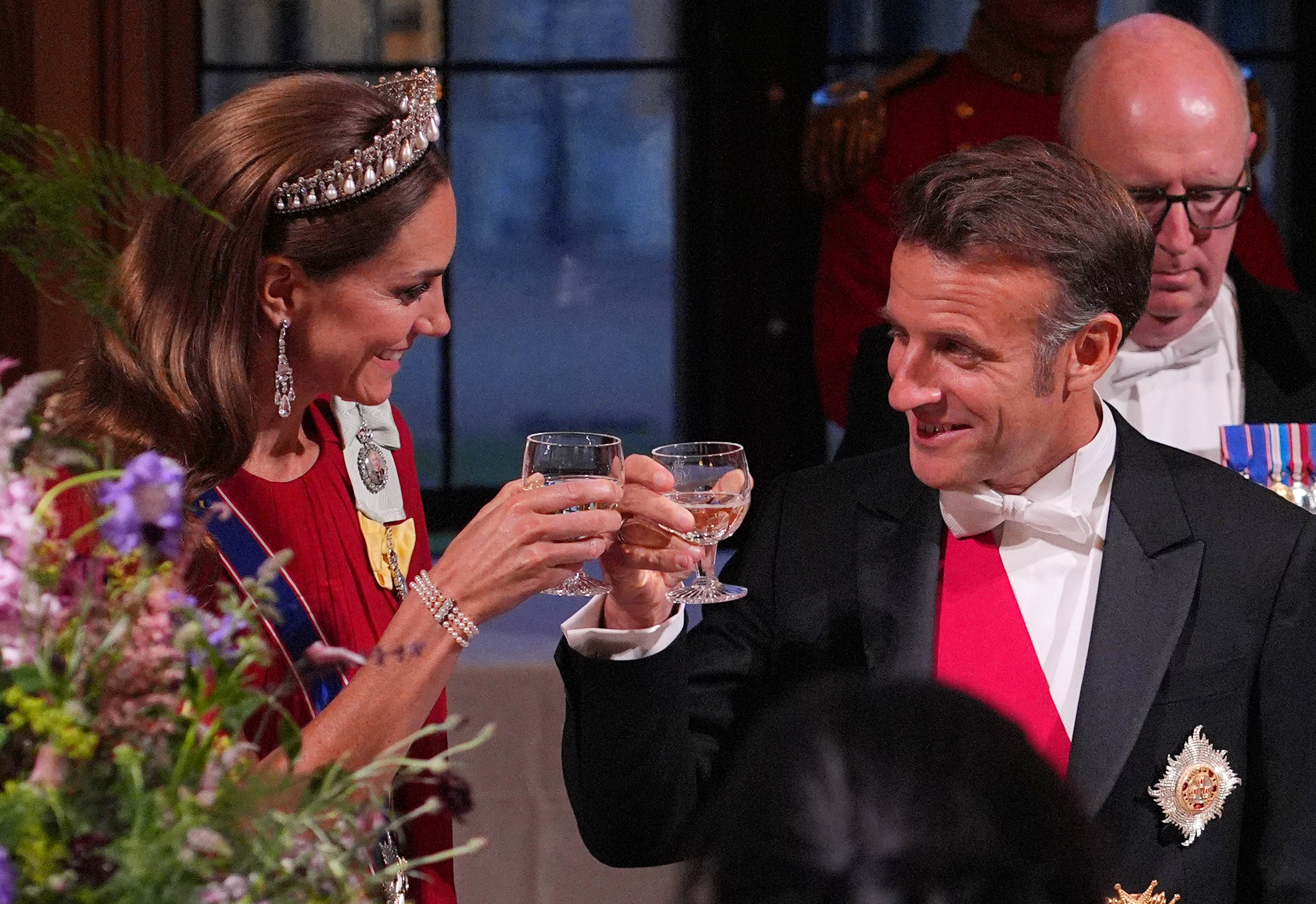 Catherine, Princess of Wales and President Emmanuel Macron clinking glasses during the State Banquet at Windsor Castle on July 8, 2025. | Source: Getty Images