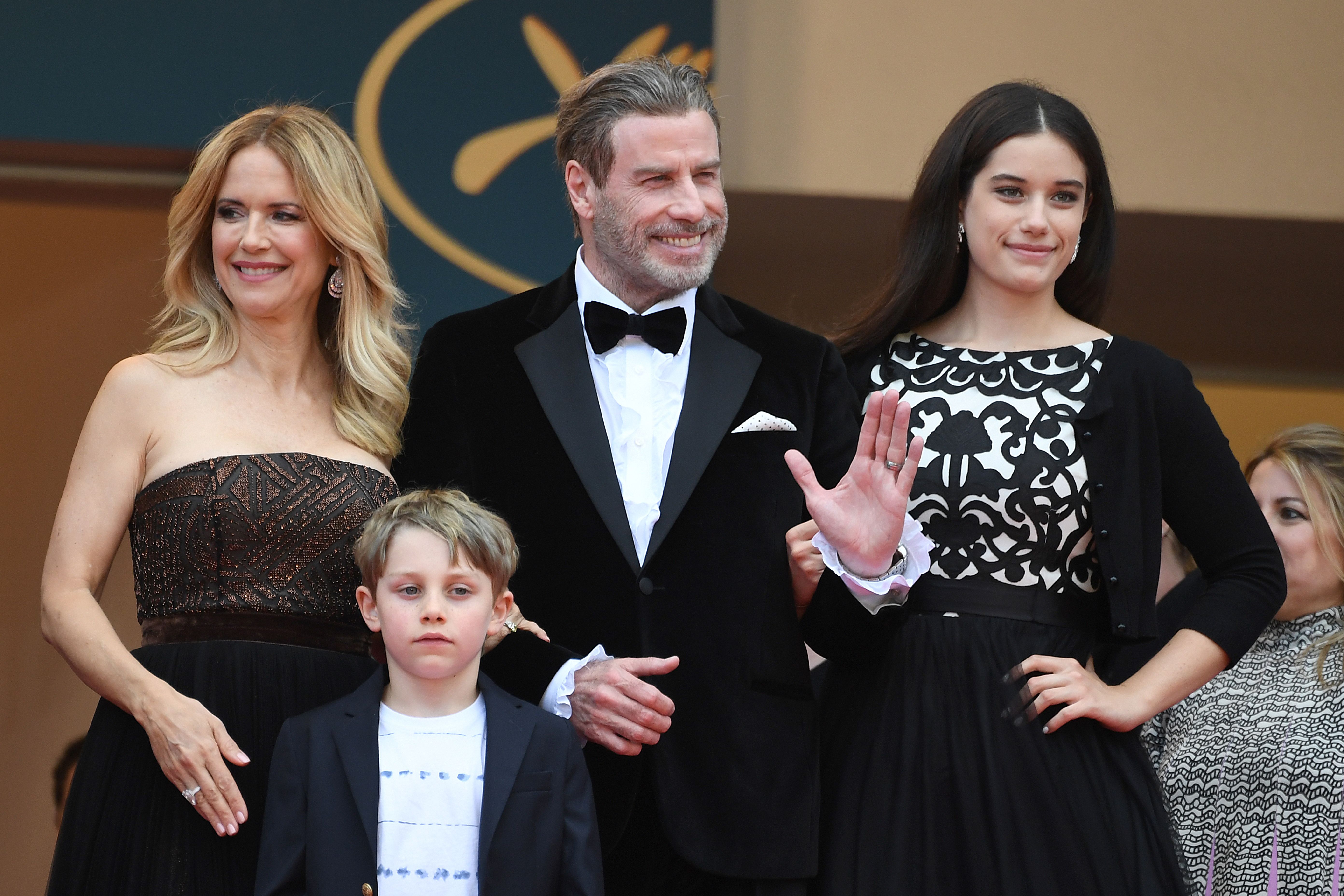 John Travolta, Kelly Preston, and their children Ella Bleu Travolta and Benjamin Travolta pose as they arrive on May 15, 2018, for the screening of the film "Solo: A Star Wars Story" at the 71st edition of the Cannes Film Festival in Cannes, southern France. | Source: Getty Images