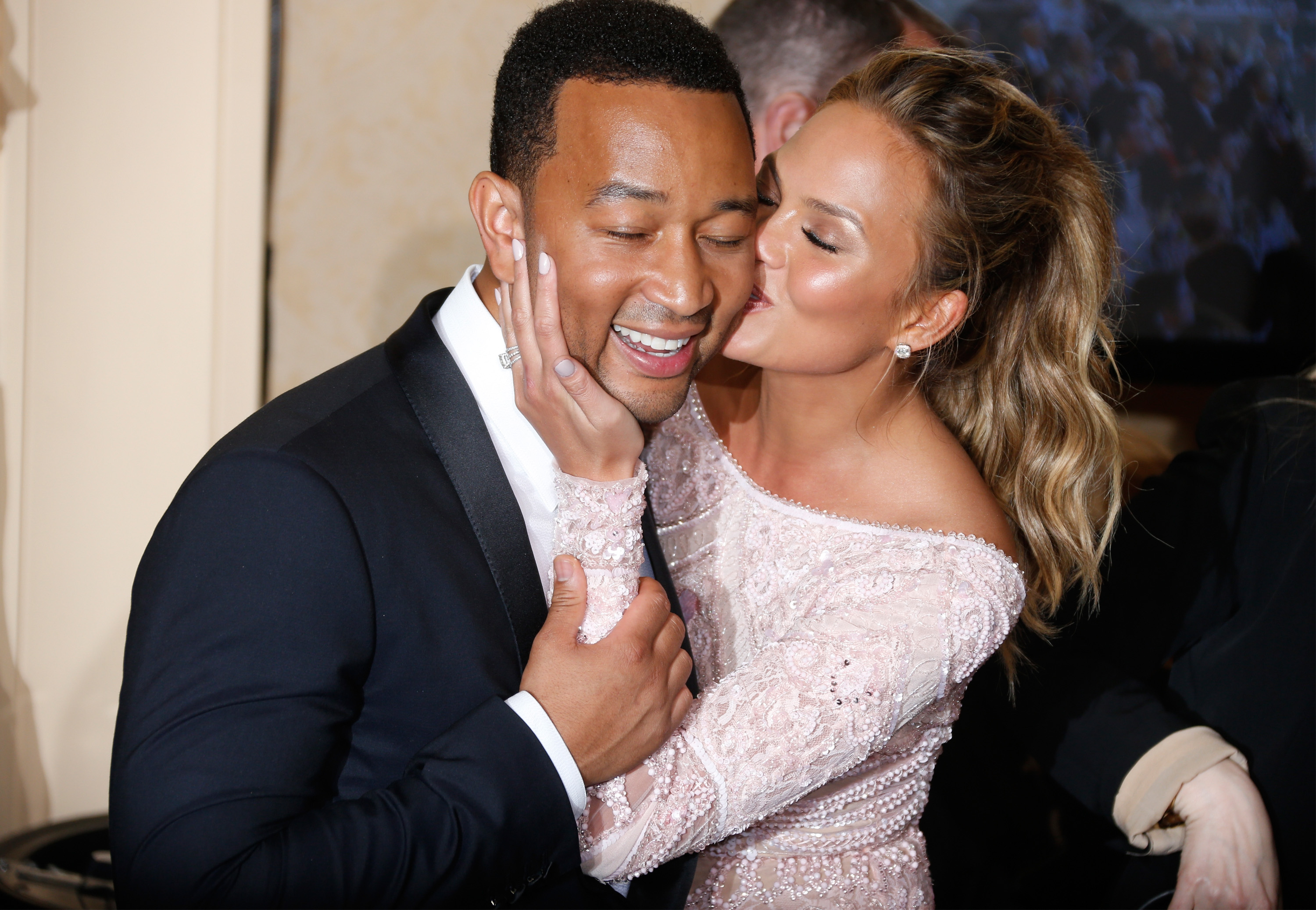 John Legend and Chrissy Teigen at the 72nd Annual Golden Globe Awards in Beverly Hills, 2015. | Source: Getty Images
