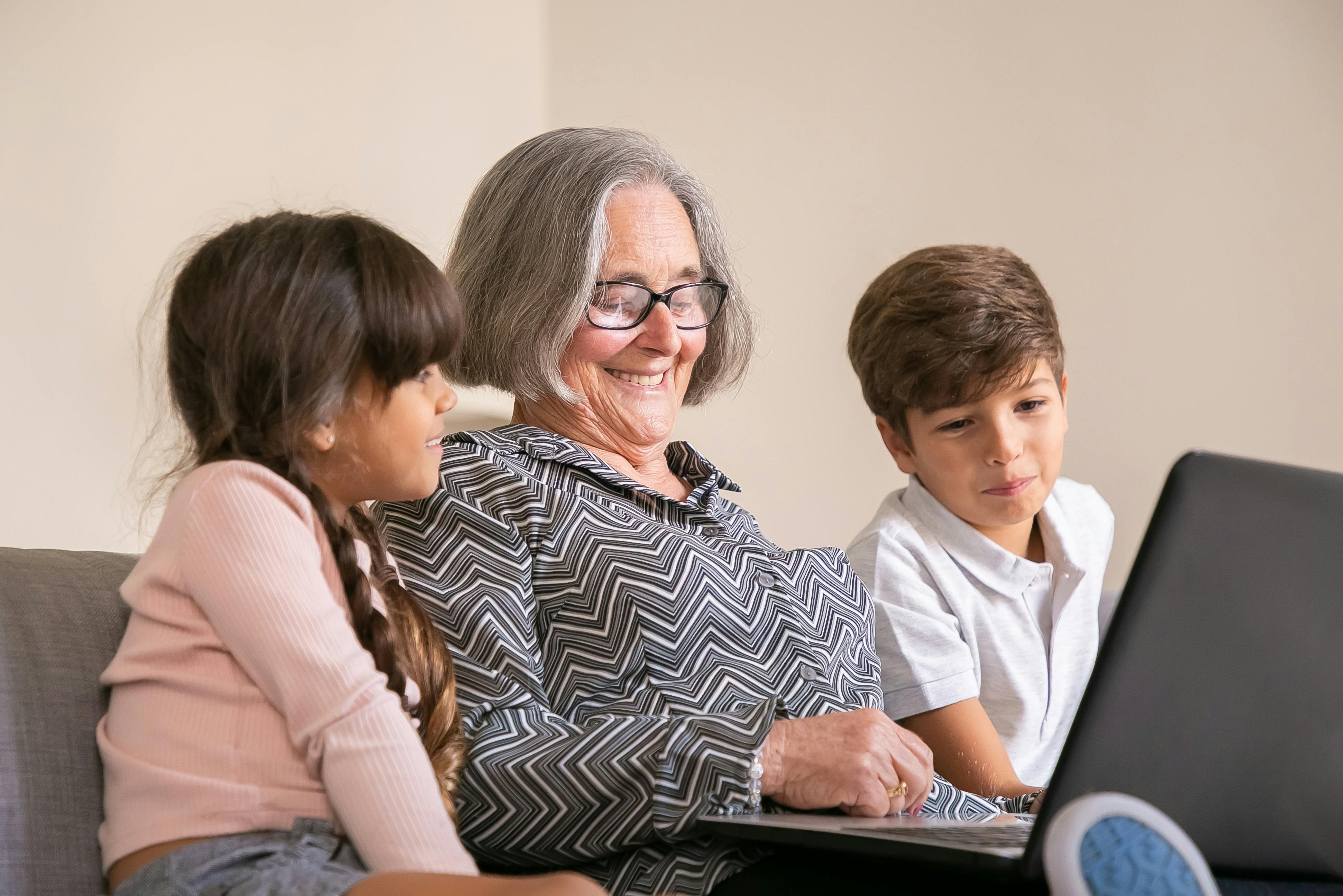 A happy grandmother with her grandkids | Source: Pexels