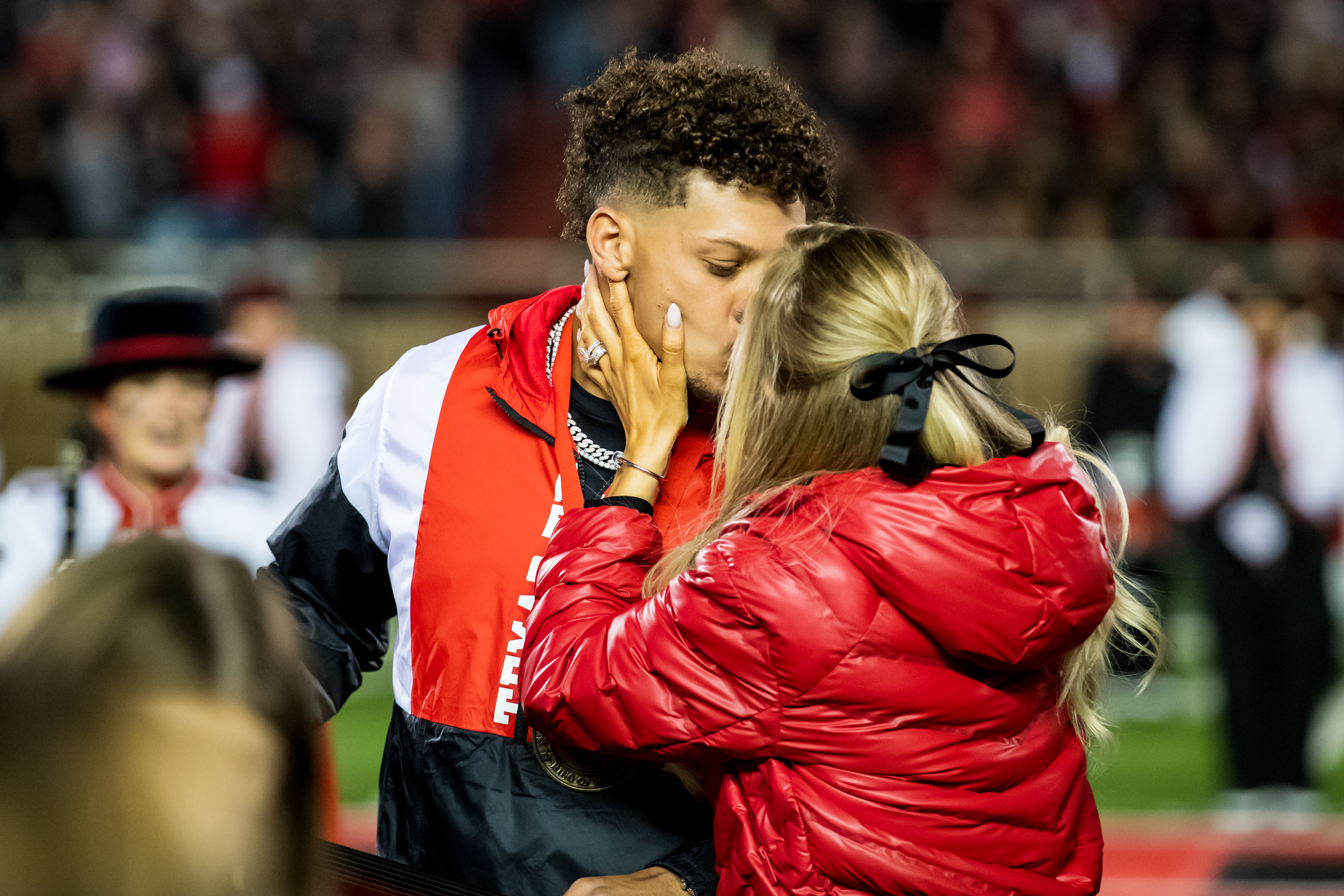 Patrick Mahomes kisses Brittany Mahomes during halftime of the game between the Texas Tech Red Raiders and the Baylor Bears at Jones AT&T Stadium on October 29, 2022, in Lubbock, Texas | Source: Getty Images