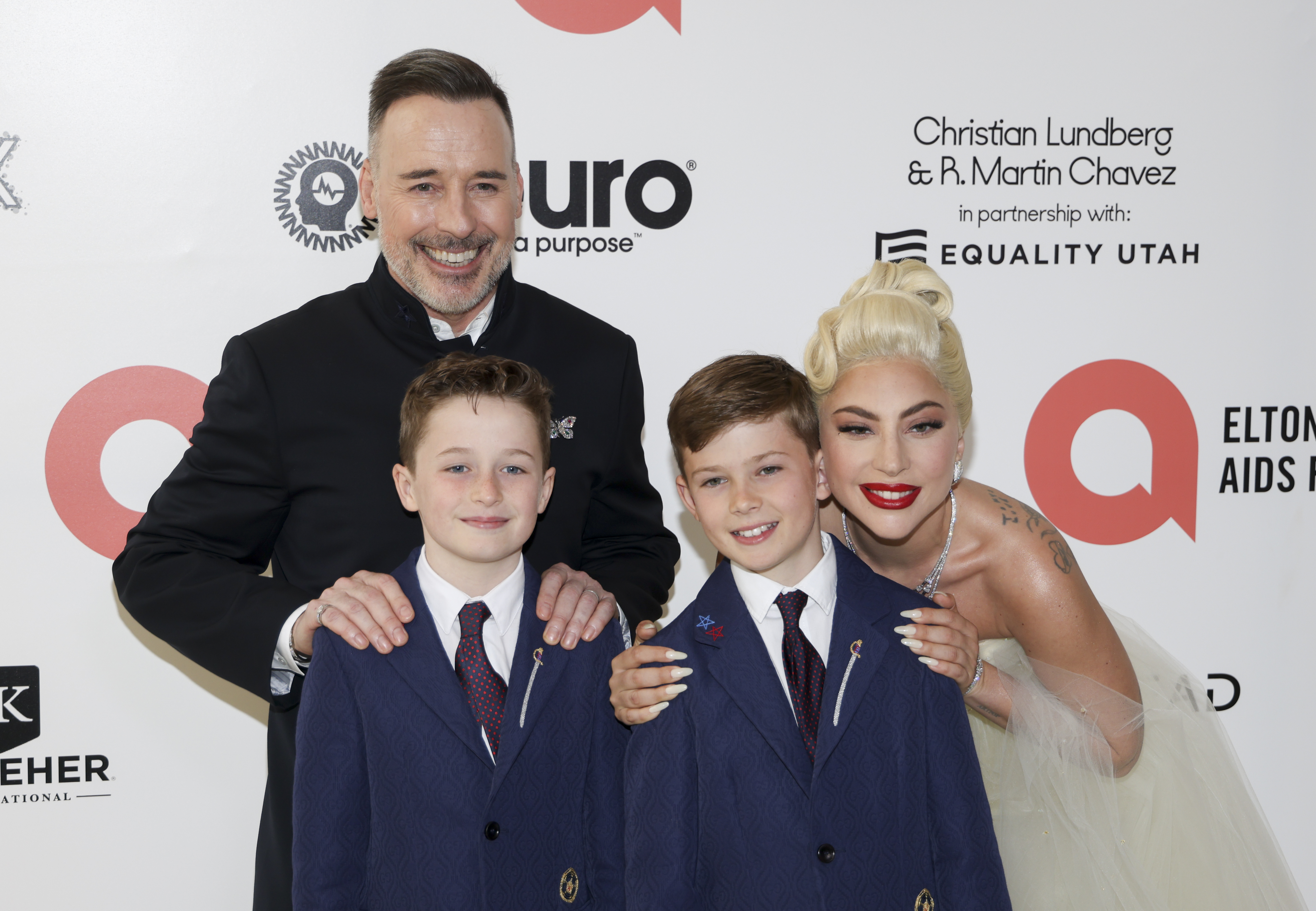 Lady Gaga with David Furnish and his sons Zachary and Elijah in California in 2022 | Source: Getty Images