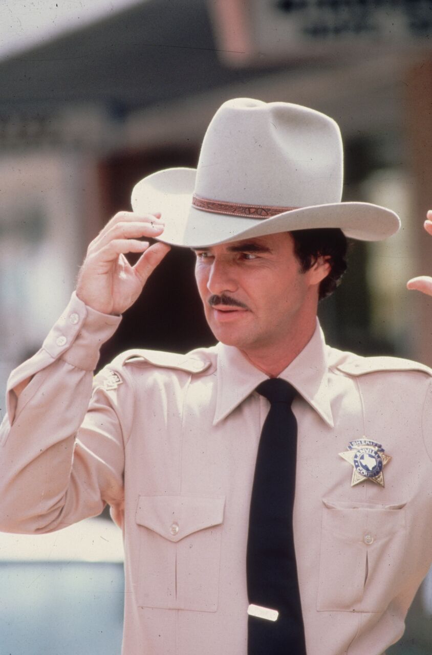 Film star Burt Reynolds as a sheriff. | Source: Getty Images