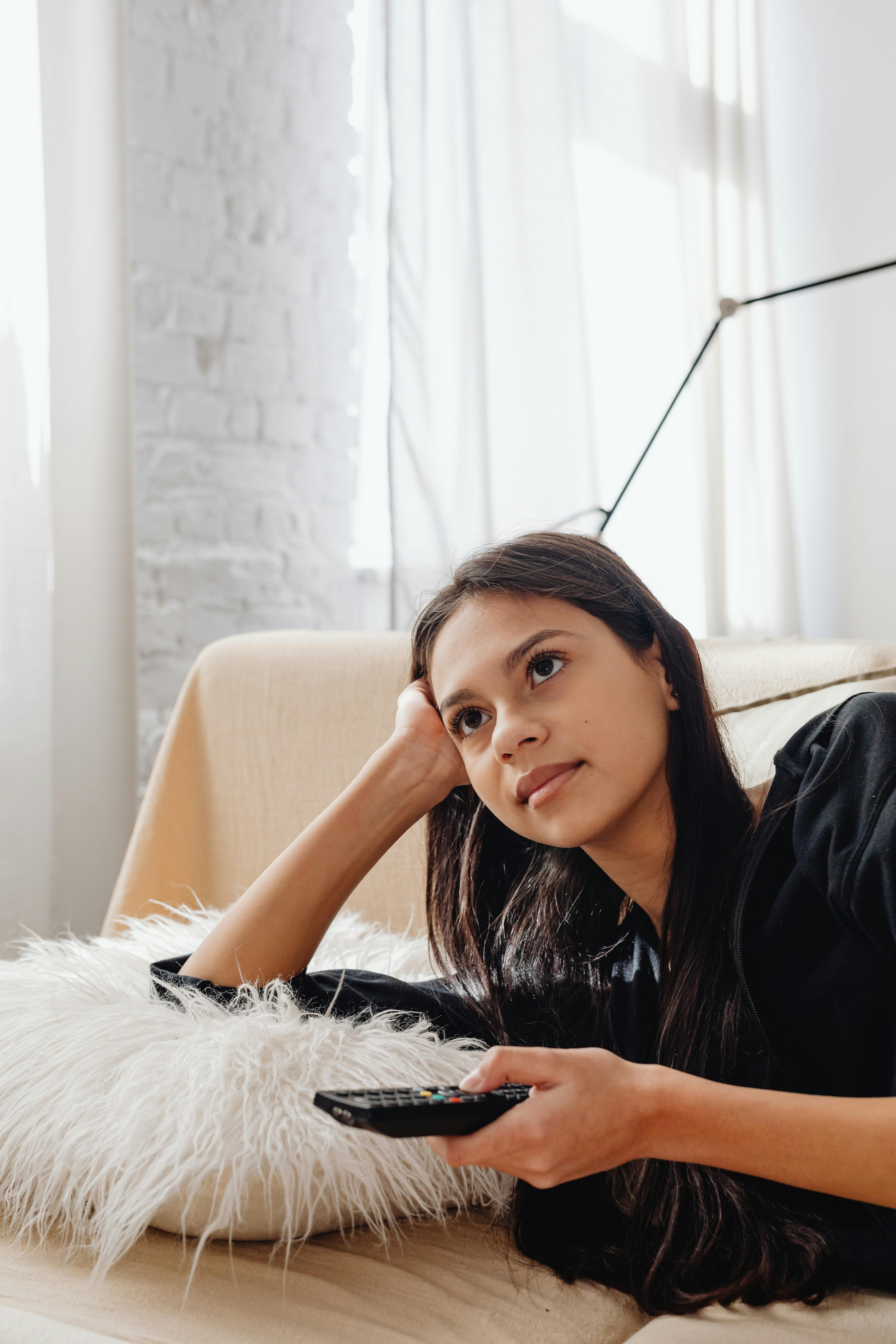 A woman lounging at home | Source: Pexels