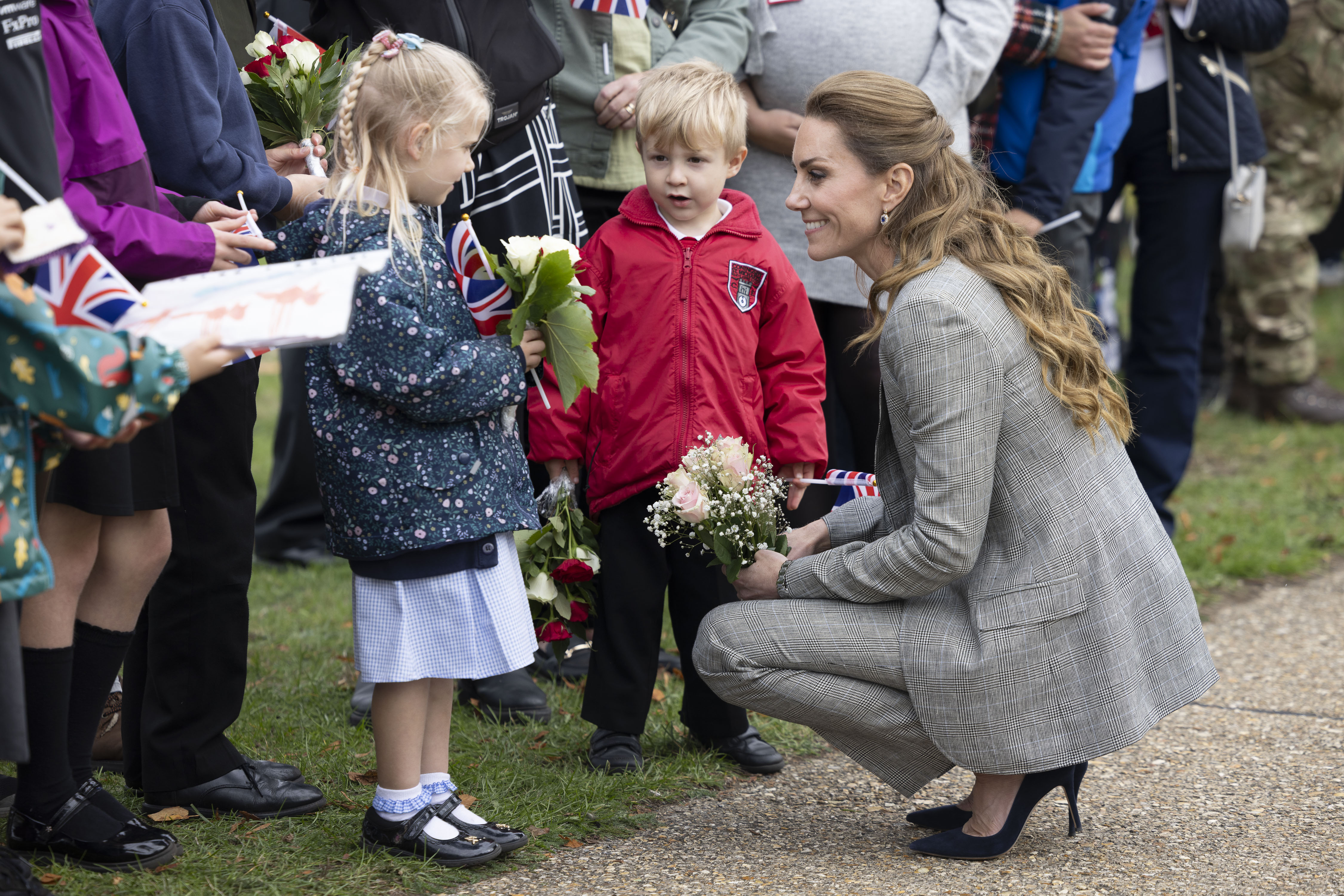 Catherine, Princess of Wales, Royal Honorary Air Commodore, meets families of personnel serving at the base on a visit to RAF Coningsby in Lincolnshire | Source: Getty Images