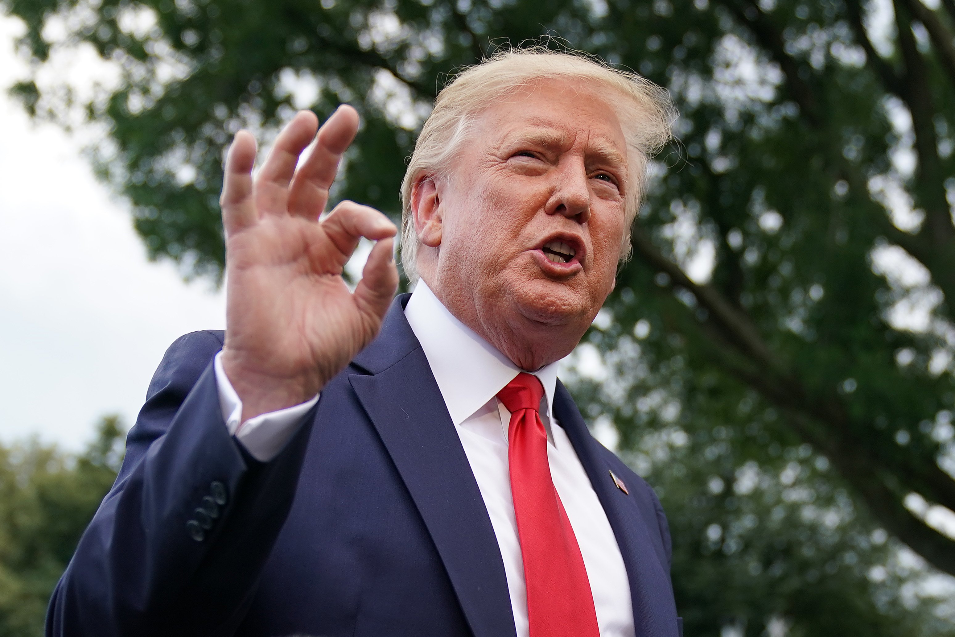 President Donald Trump addressing the media outside the White House before a campaign rally | Photo: Getty Images