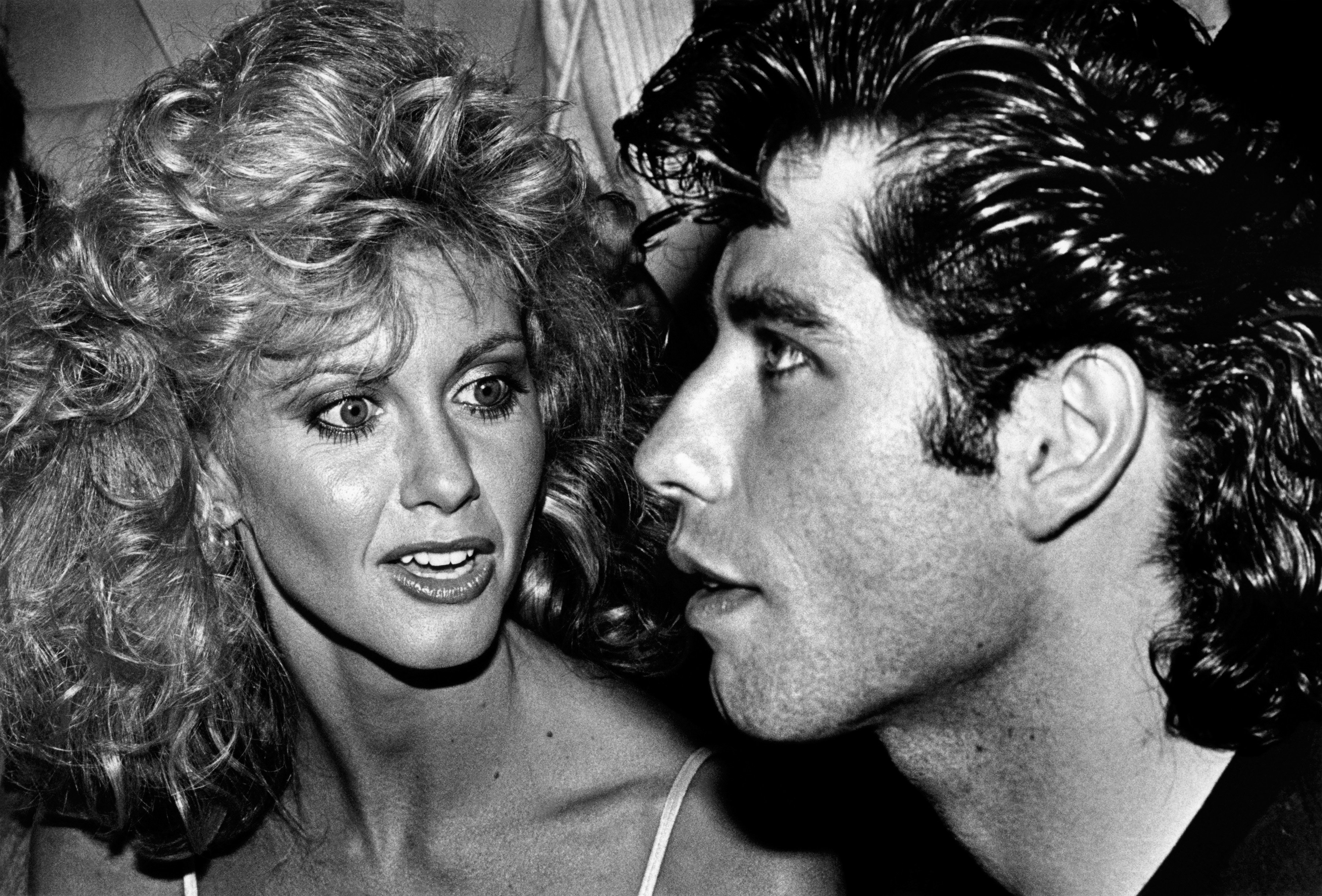Olivia Newton-John and co-star John Travolta attend their 1978 Hollywood, California, premiere of "Grease." | Source: Getty Images. 