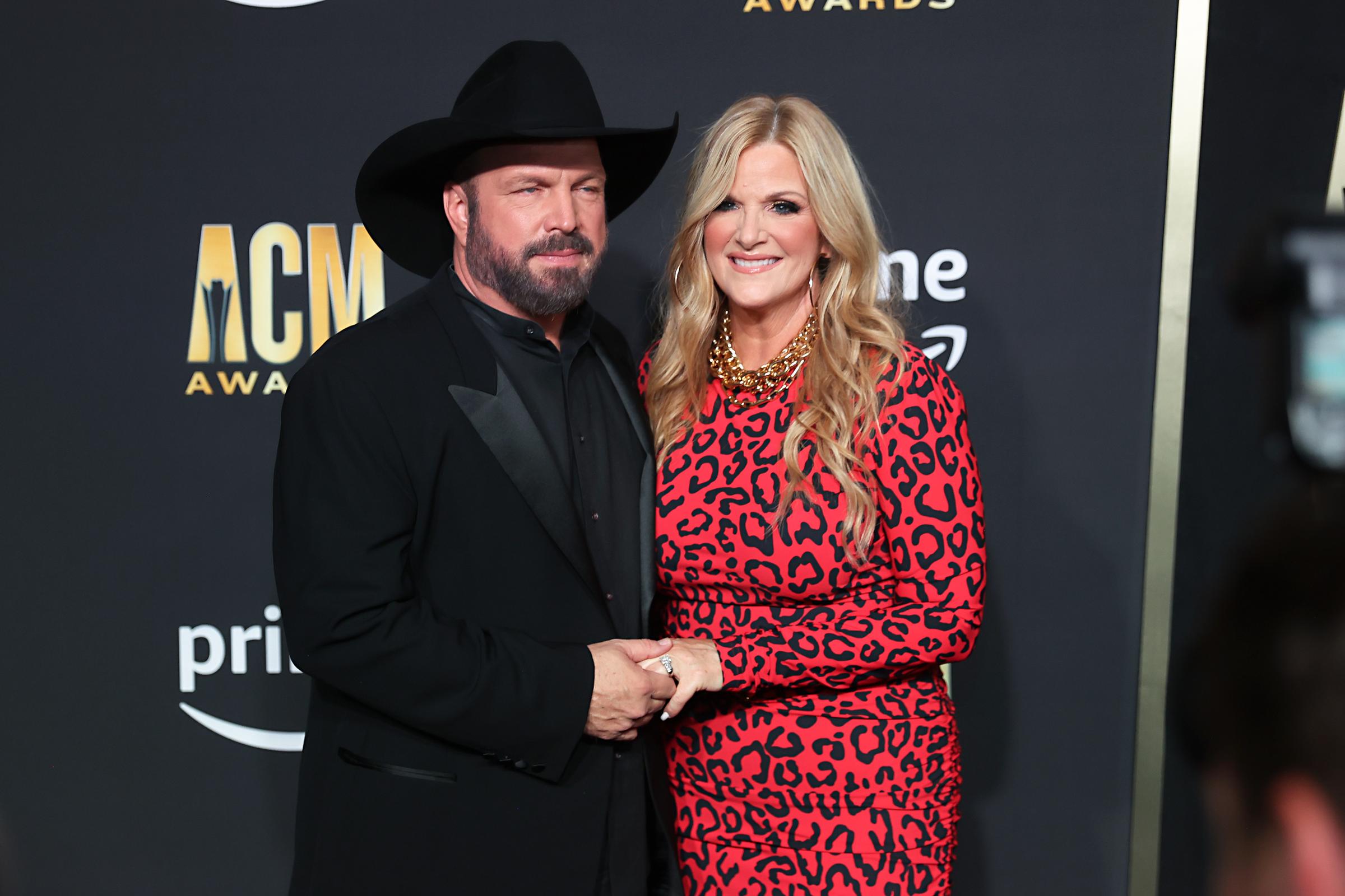 Garth Brooks and Trisha Yearwood pose for a picture during the 58th Academy of Country Music awards at The Ford Center at The Star in Frisco, Texas, on May 11, 2023 | Source: Getty Images