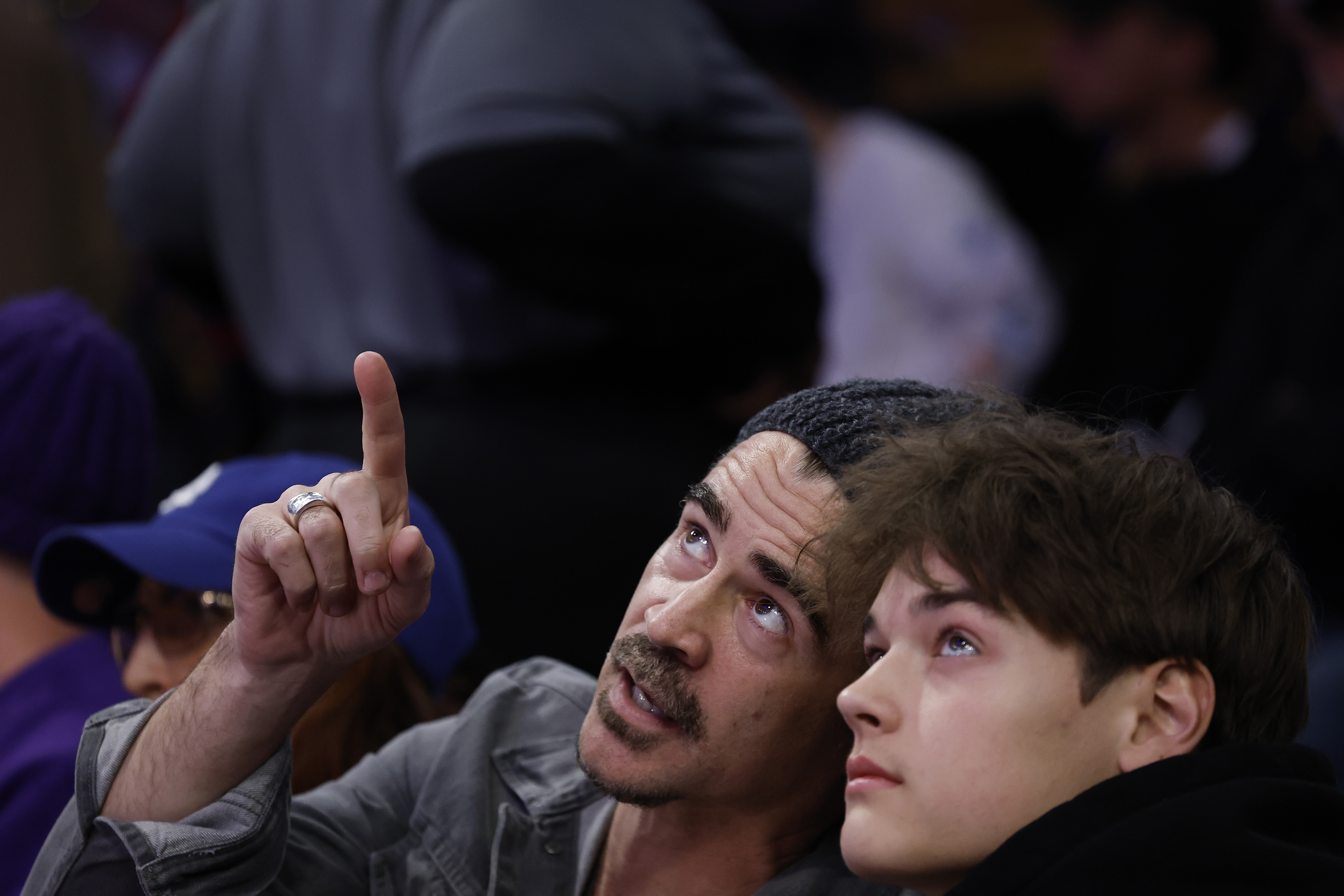Colin Farrell and James look on during the Emirates NBA Cup game between the Los Angeles Lakers and the Oklahoma City Thunder on November 29, 2024 in Los Angeles, California | Source: Getty Images