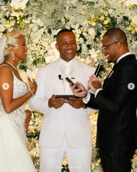 LeToya Luckett and Taleo Coles exchanging vows on their wedding day, posted on August 1, 2024 | Source: Instagram/devonfranklin